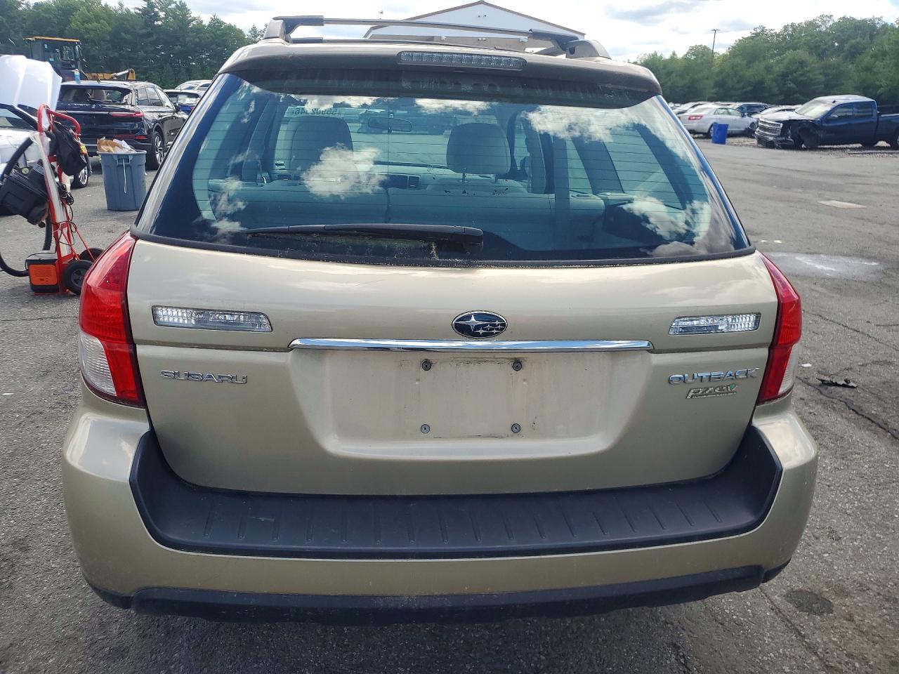 2009 Subaru Outback 2.5i Gold vin: 4S4BP61CX97331734