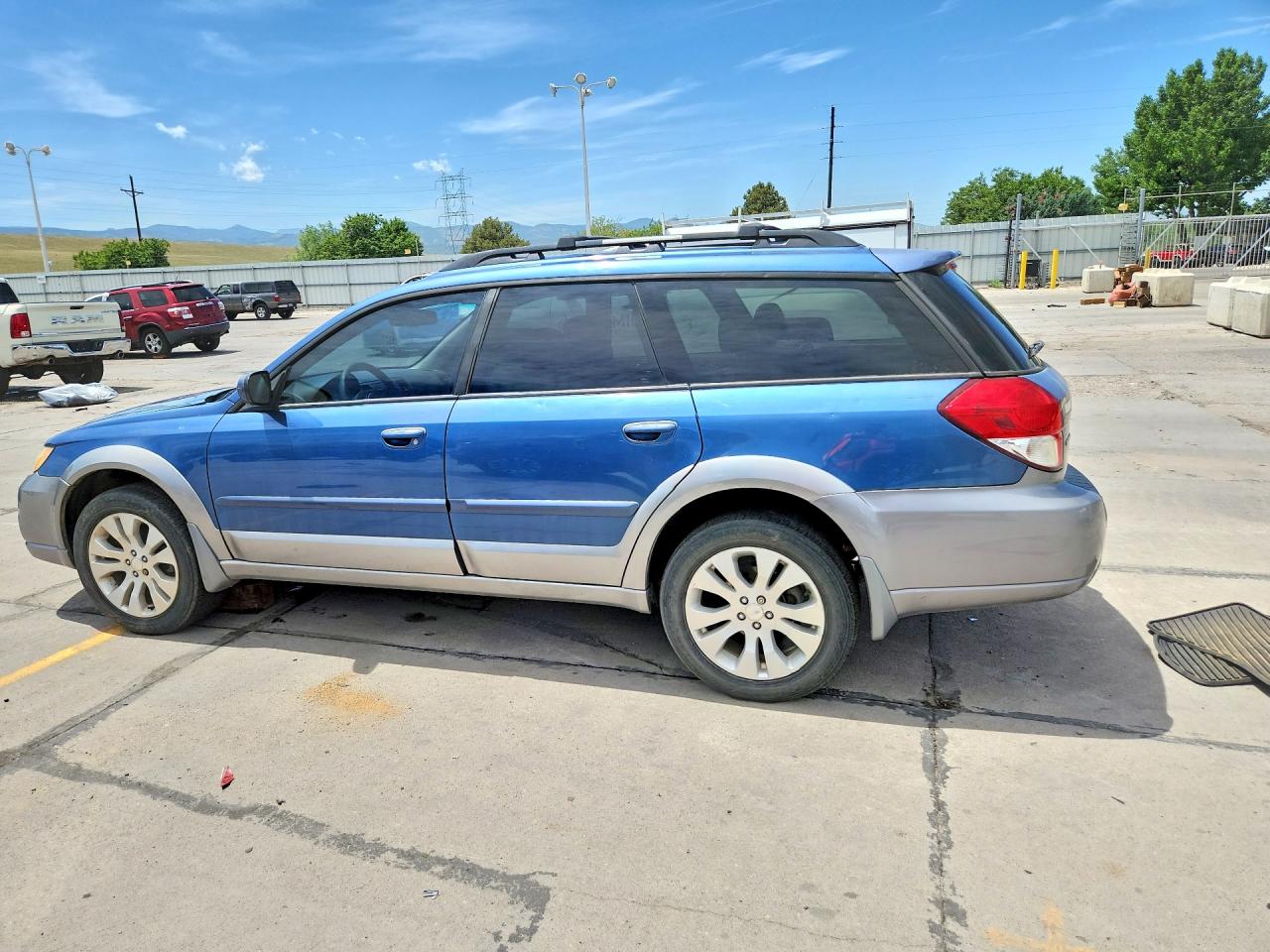 2009 Subaru Outback 2.5i Limited Blue vin: 4S4BP66C197310313