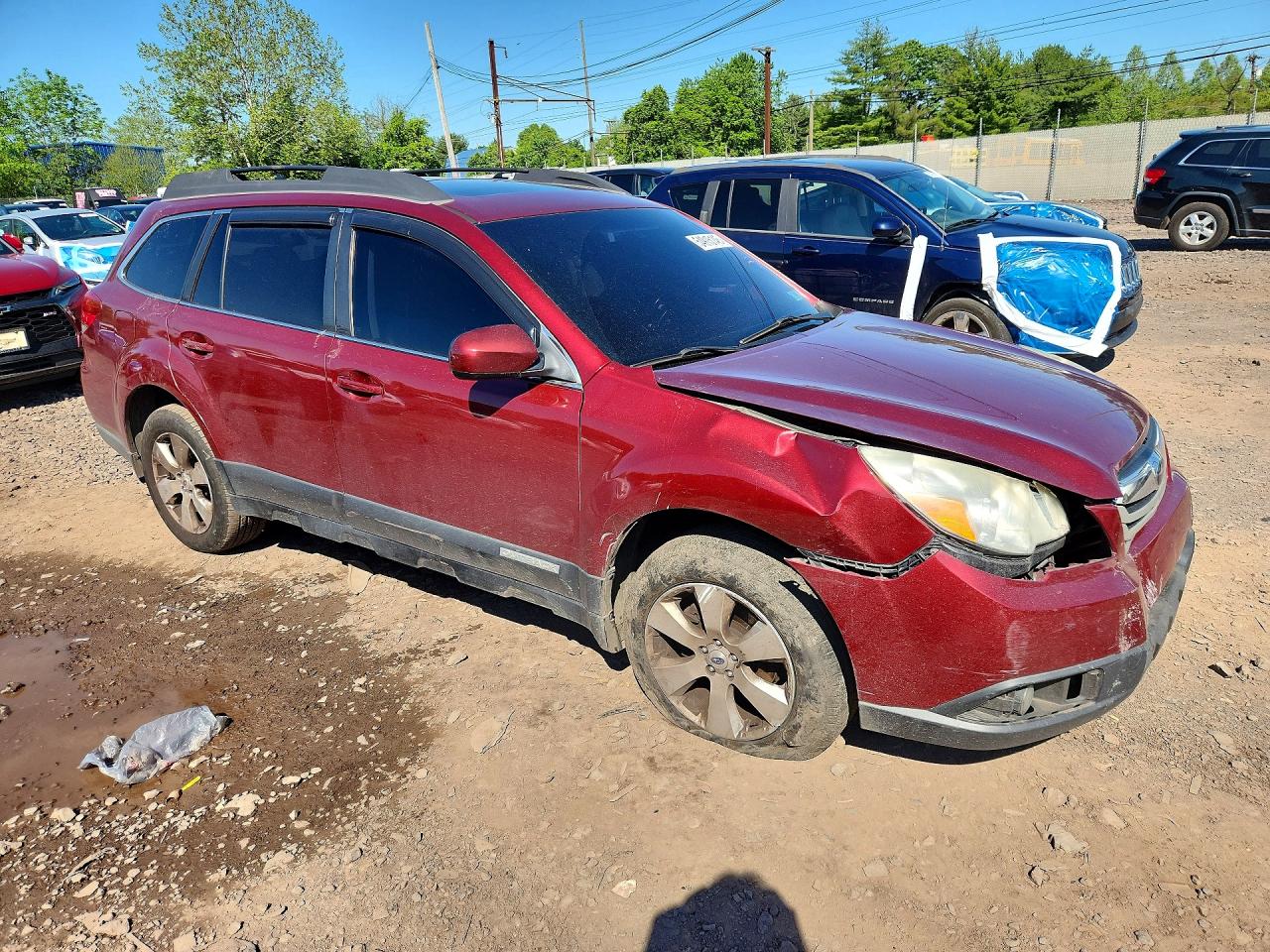 2012 Subaru Outback 2.5i Limited Burgundy vin: 4S4BRBKC3C3245553