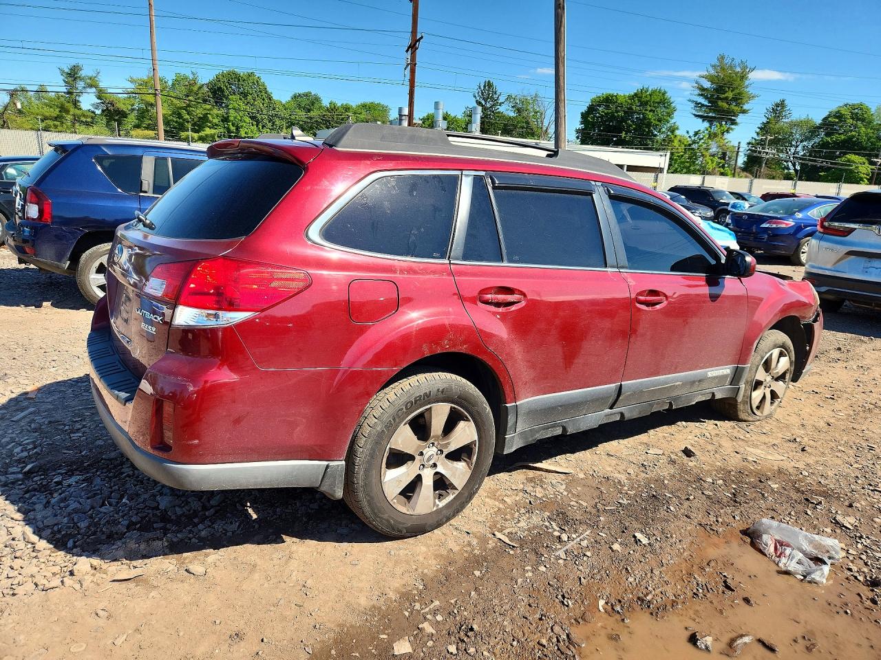 2012 Subaru Outback 2.5i Limited Burgundy vin: 4S4BRBKC3C3245553