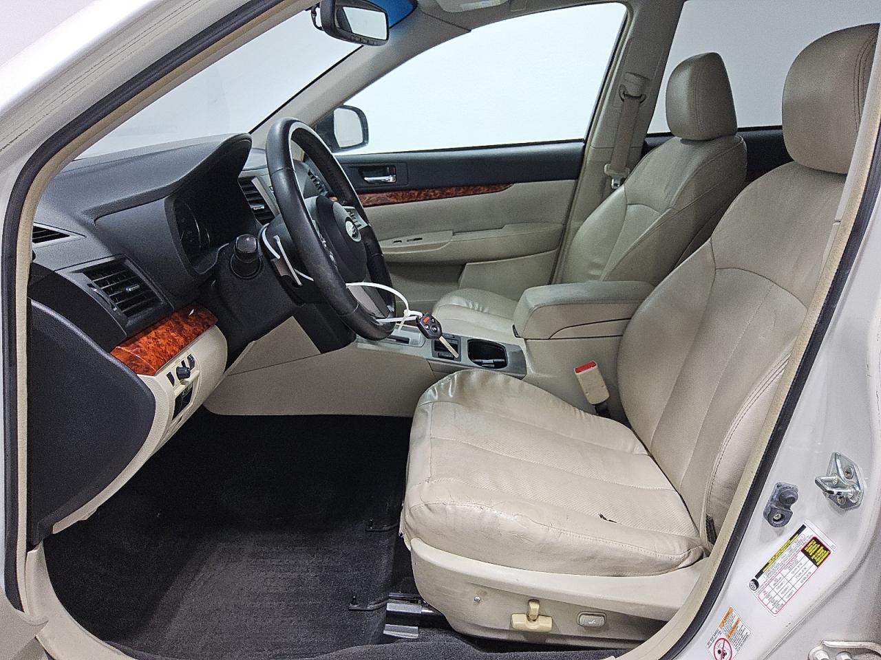 2011 Subaru Outback 2.5i Limited White vin: 4S4BRBKC4B3358751 Damage: Left Front Seat Cushion, Torn, 1 To 2 Inches
