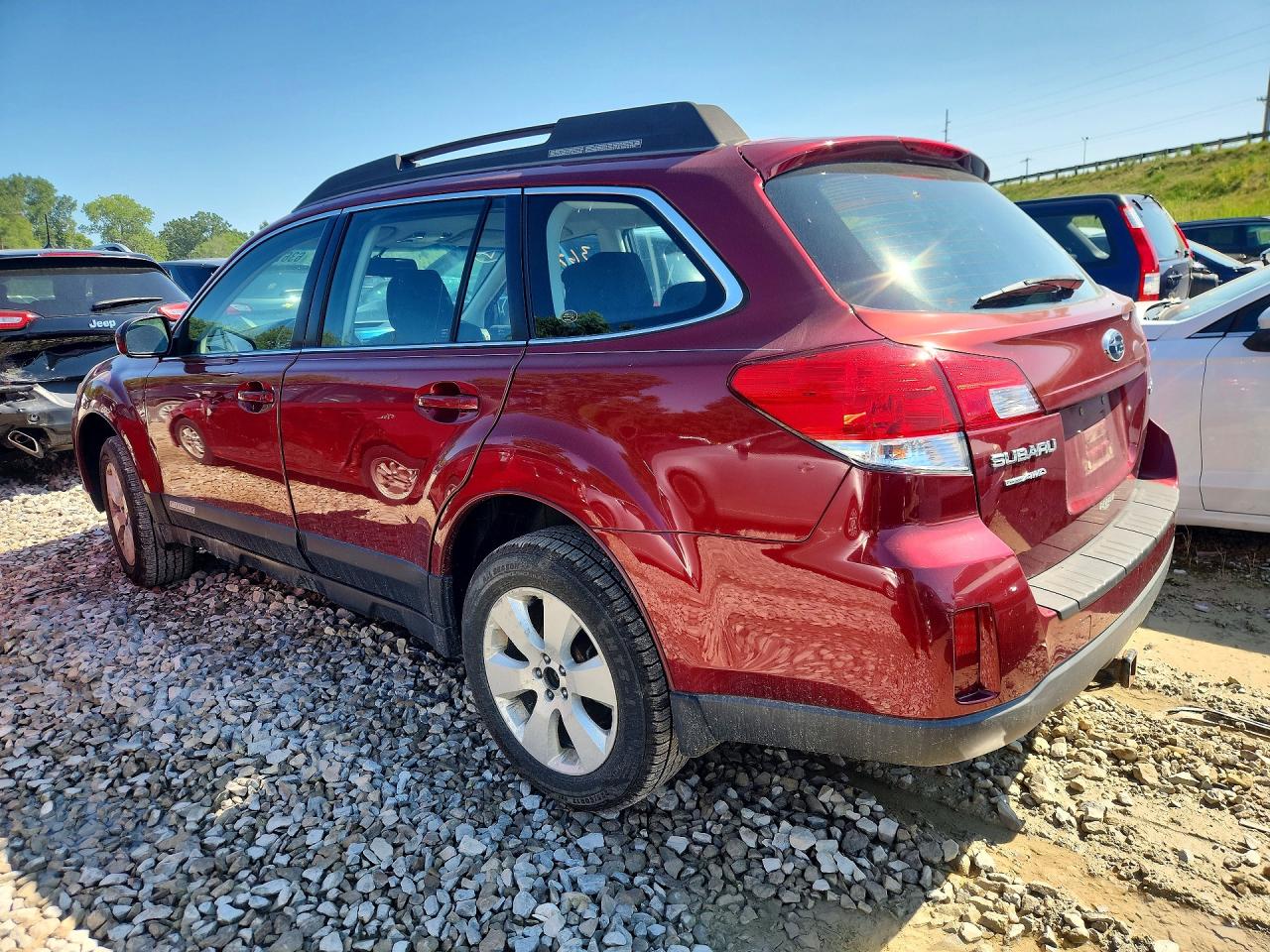2012 Subaru Outback 2.5i Red vin: 4S4BRCAC9C3288107