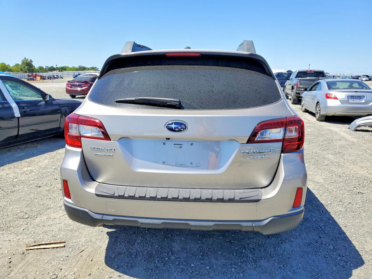 2015 Subaru Outback 2.5i Premium Tan vin: 4S4BSACC5F3243434