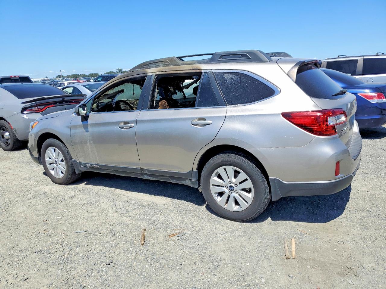 2015 Subaru Outback 2.5i Premium Tan vin: 4S4BSACC5F3243434