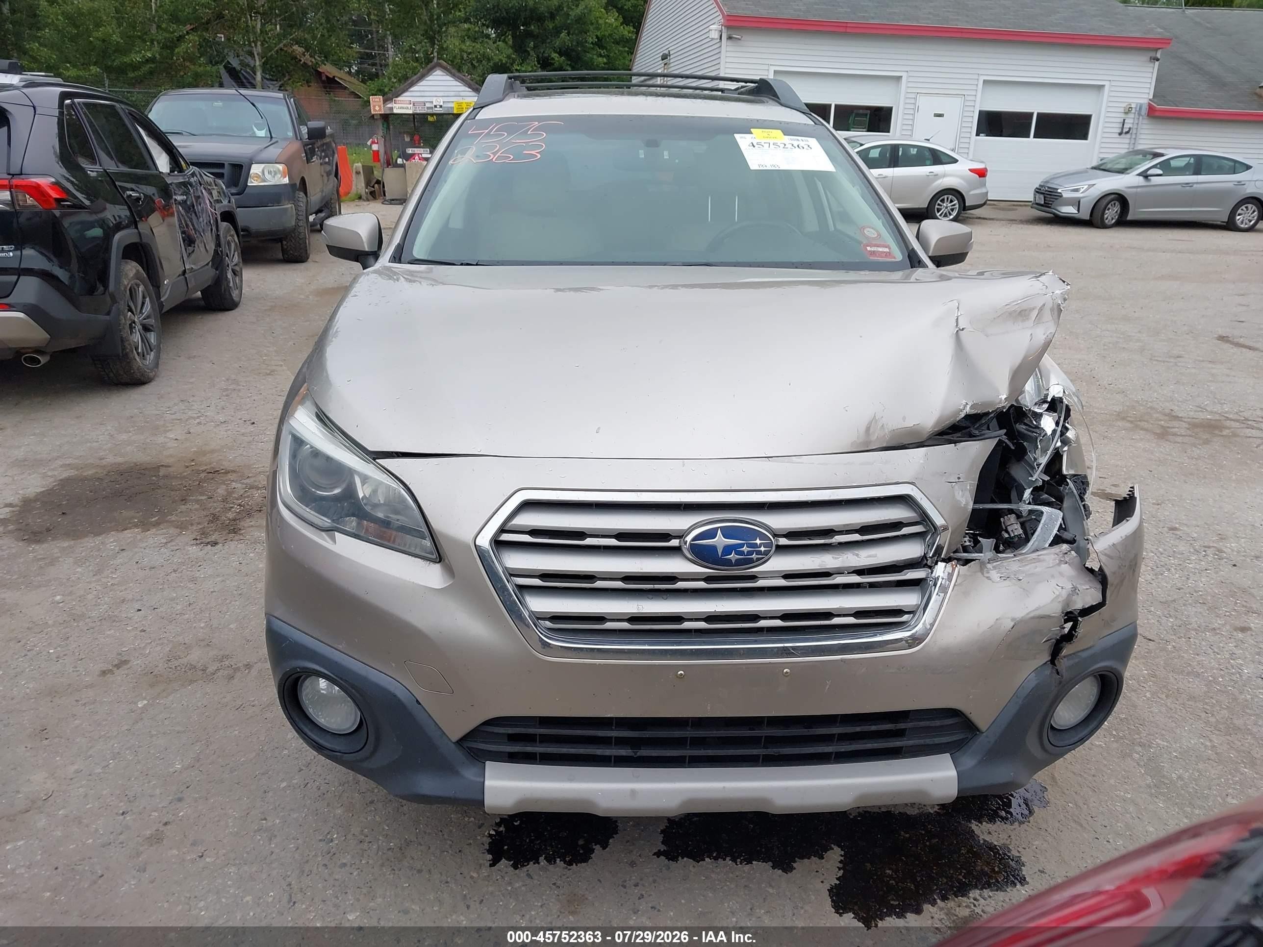 2015 Subaru Outback 2.5i Limited Tan vin: 4S4BSALCXF3219632