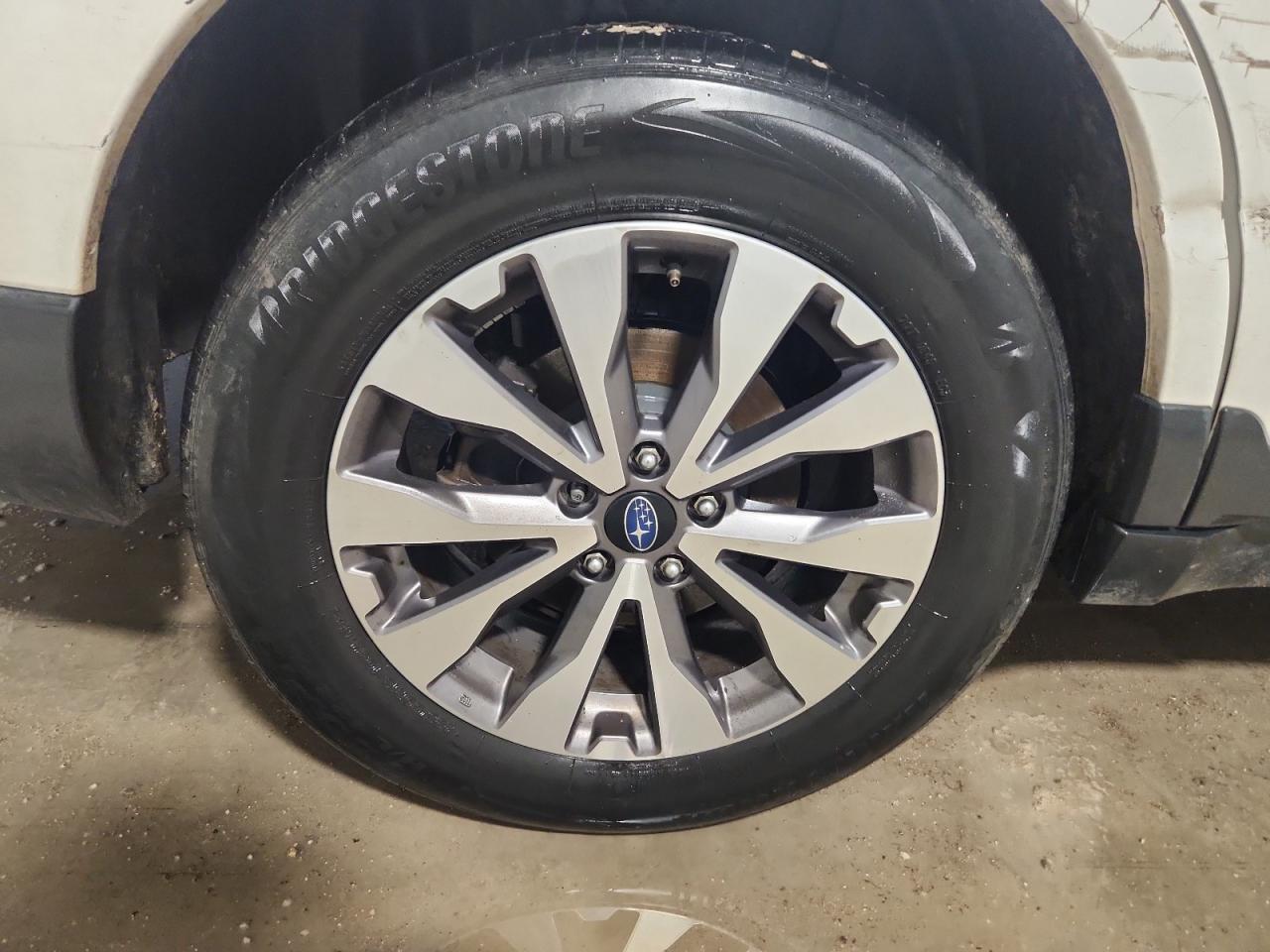2019 Subaru Outback Touring White vin: 4S4BSATC4K3255567 Damage: Right Rear Tire, Flat, Repair Required