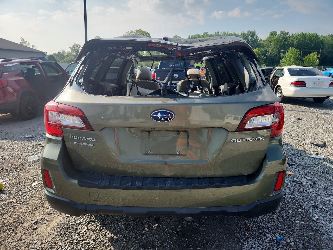 2015 Subaru Outback 2.5i Limited Tan vin: 4S4BSBLCXF3312222