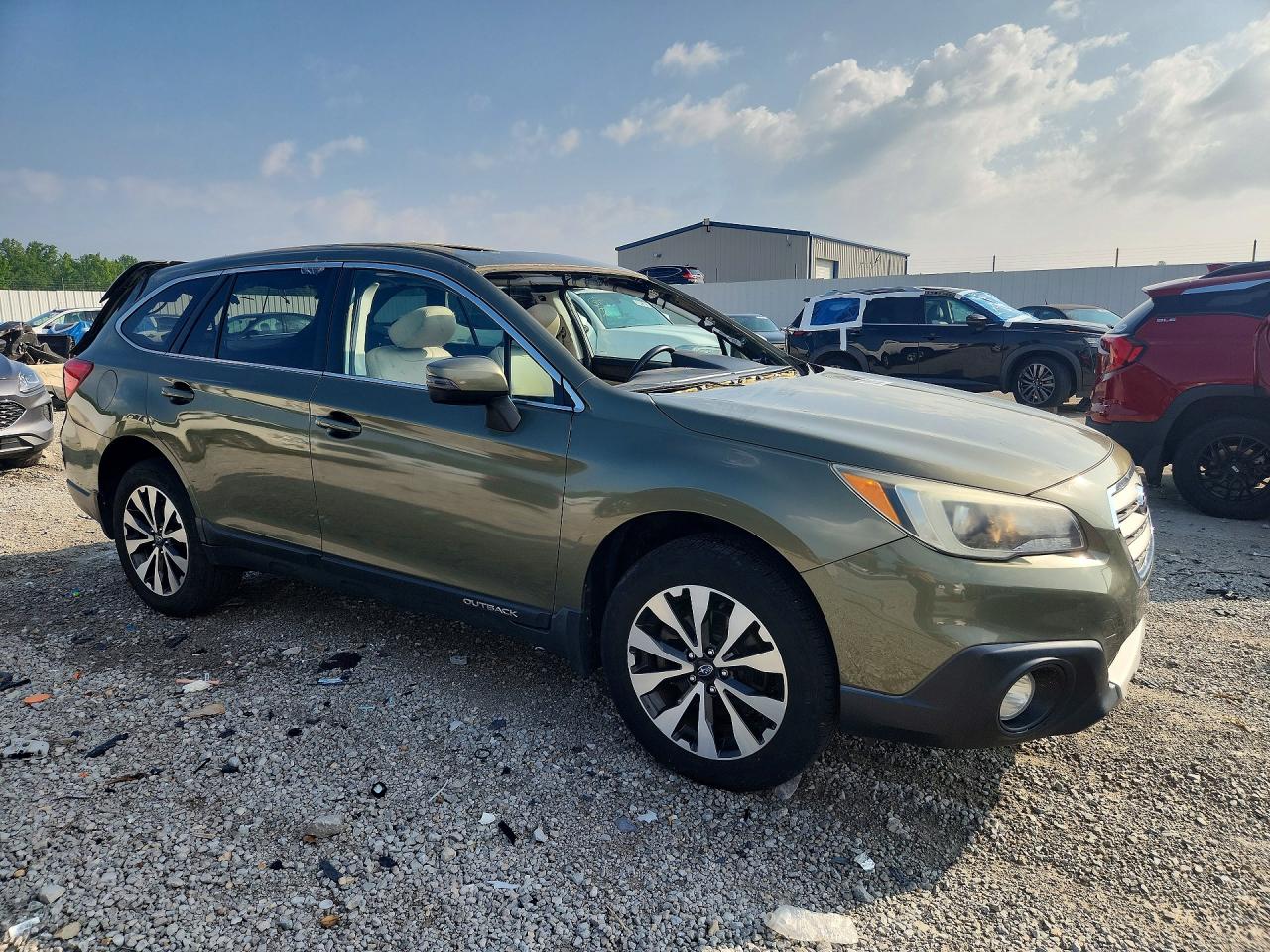 2015 Subaru Outback 2.5i Limited Tan vin: 4S4BSBLCXF3312222
