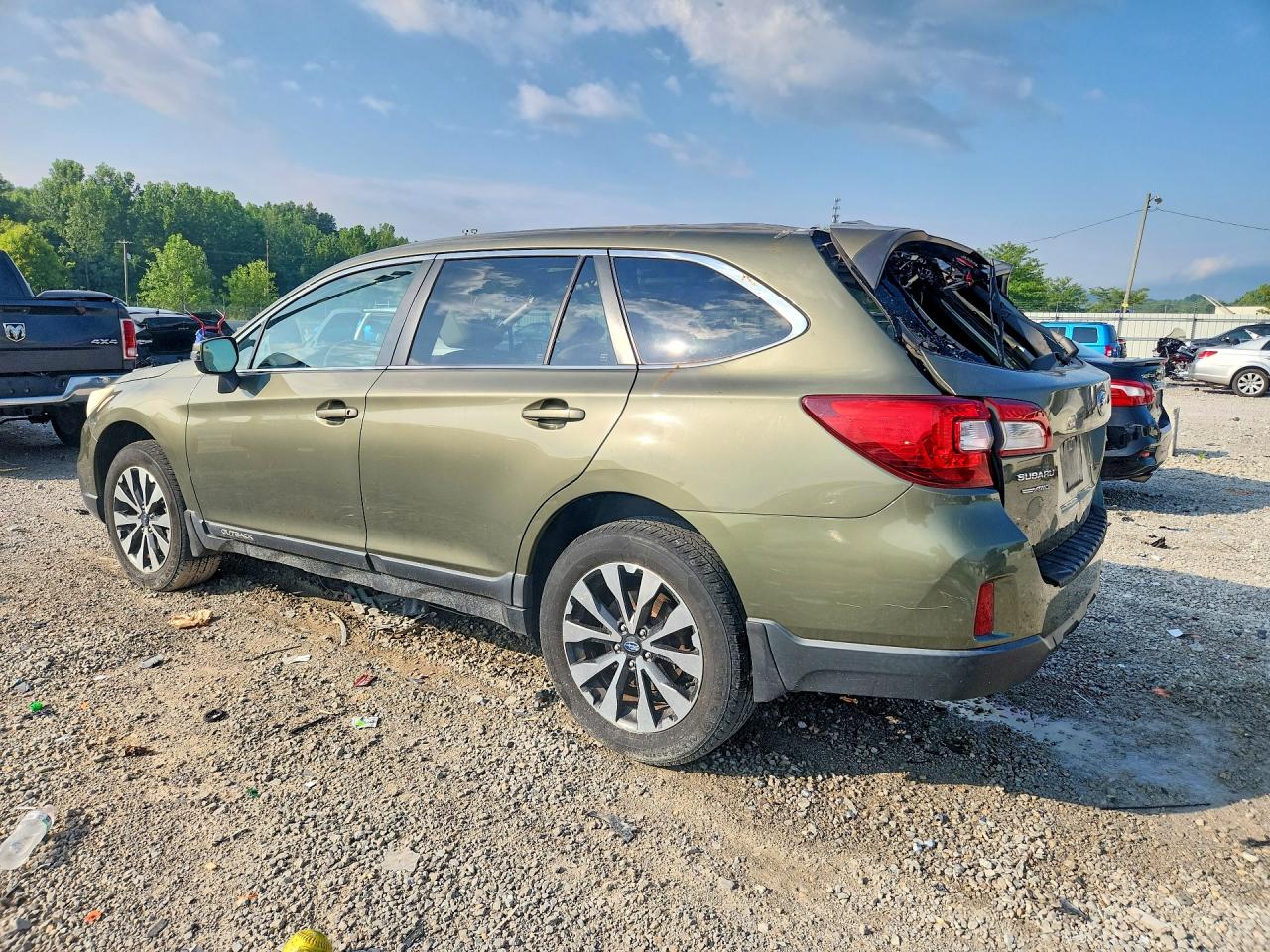 2015 Subaru Outback 2.5i Limited Tan vin: 4S4BSBLCXF3312222
