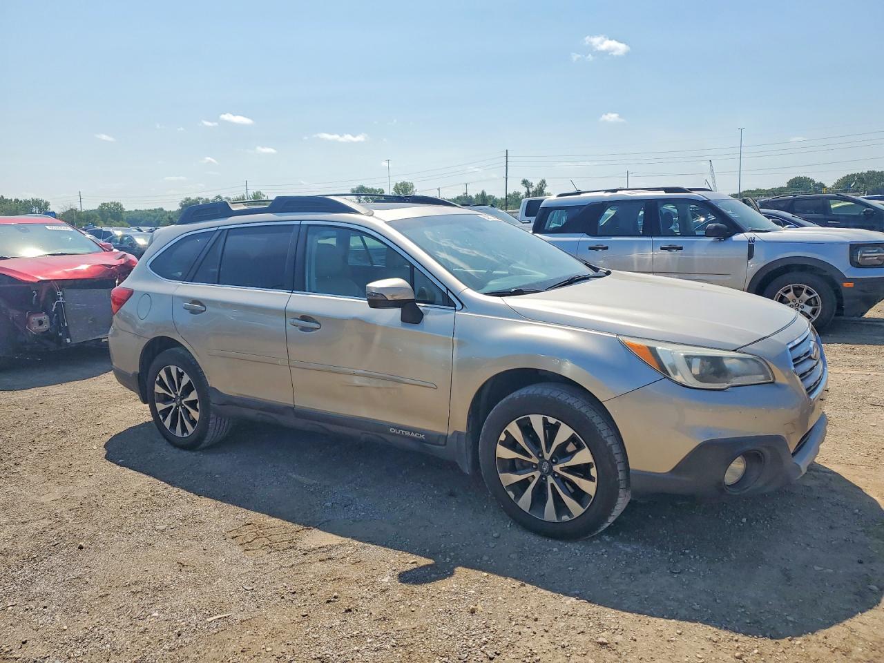 2015 Subaru Outback 2.5i Limited Золотой vin: 4S4BSBNC7F3280746