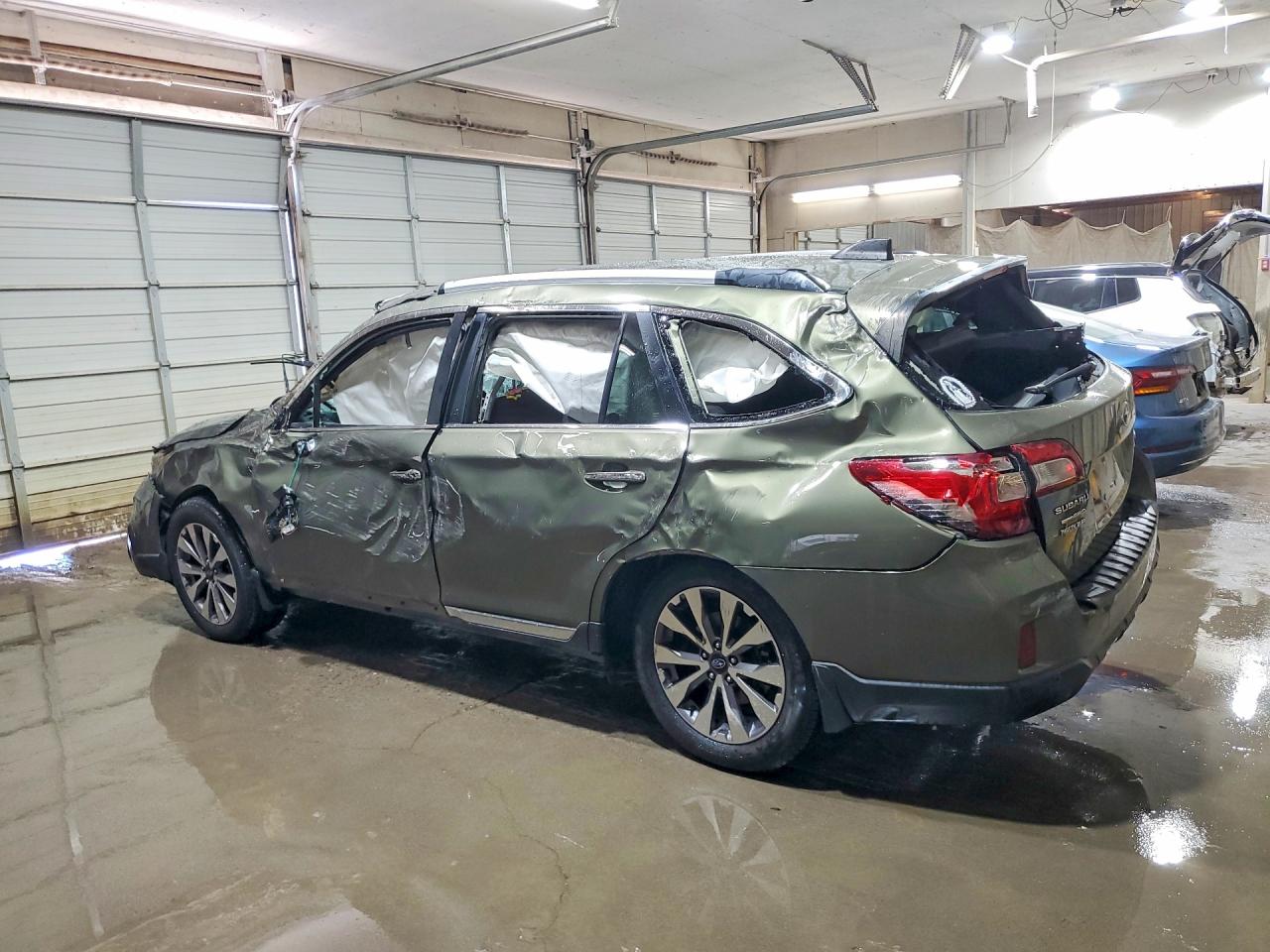 2017 Subaru Outback Touring Green vin: 4S4BSETC6H3356898