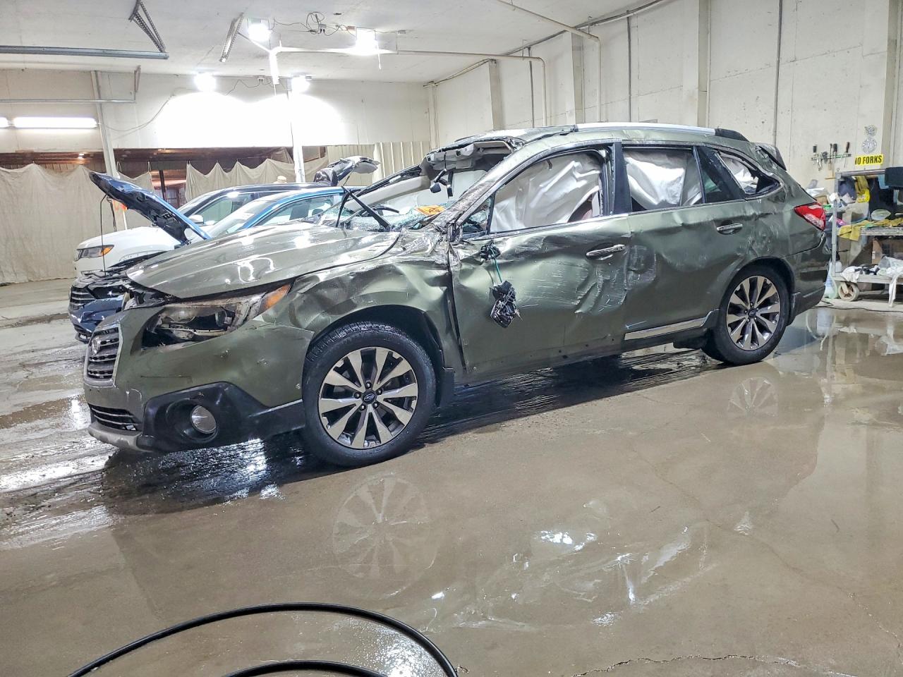 2017 Subaru Outback Touring Green vin: 4S4BSETC6H3356898