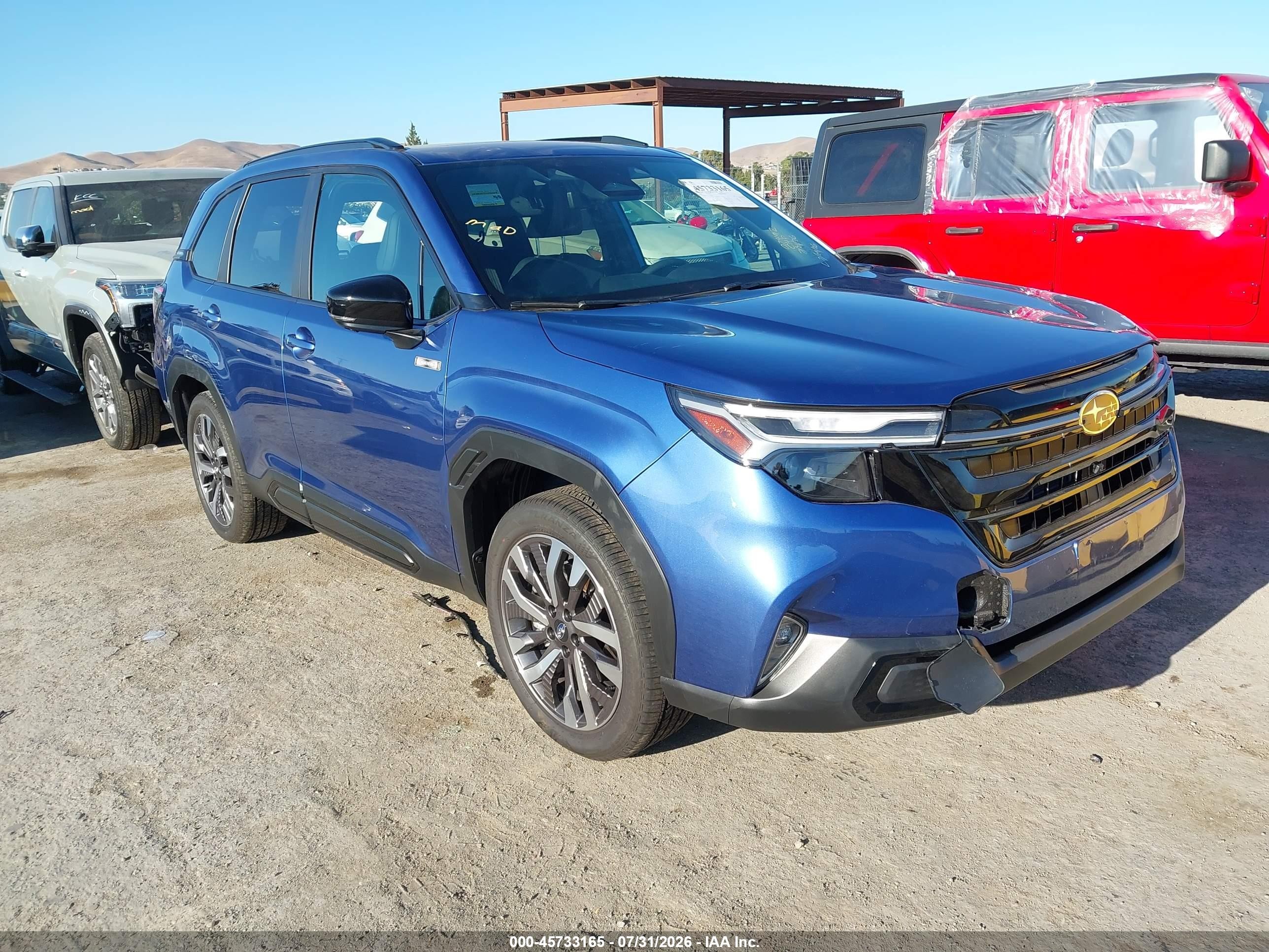 2026 Subaru Forester Touring Blue vin: 4S4SLST73T3059191
