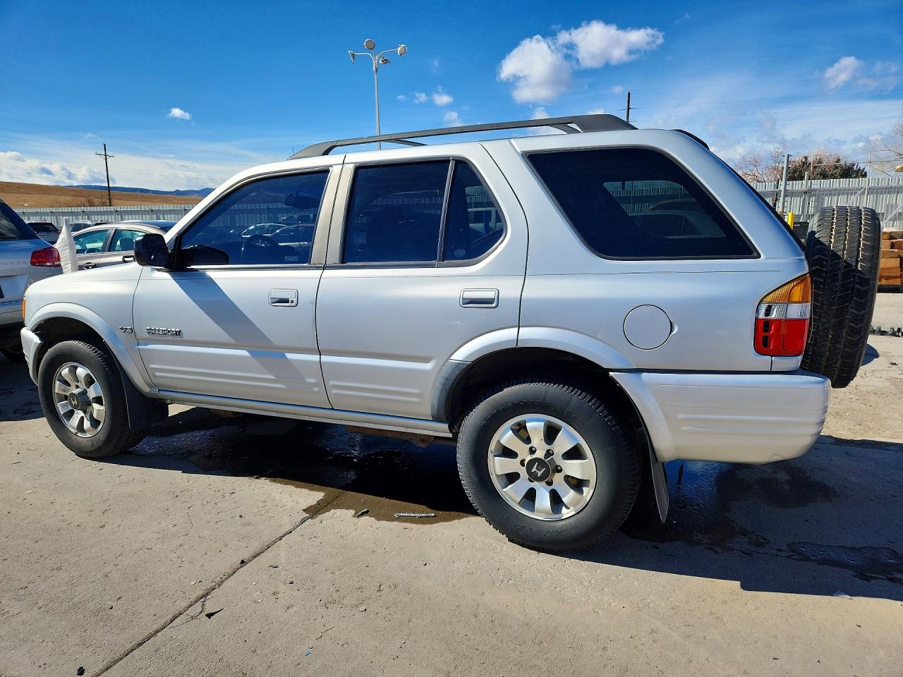 1999 Honda Passport Ex Silver vin: 4S6CM58W1X4424168