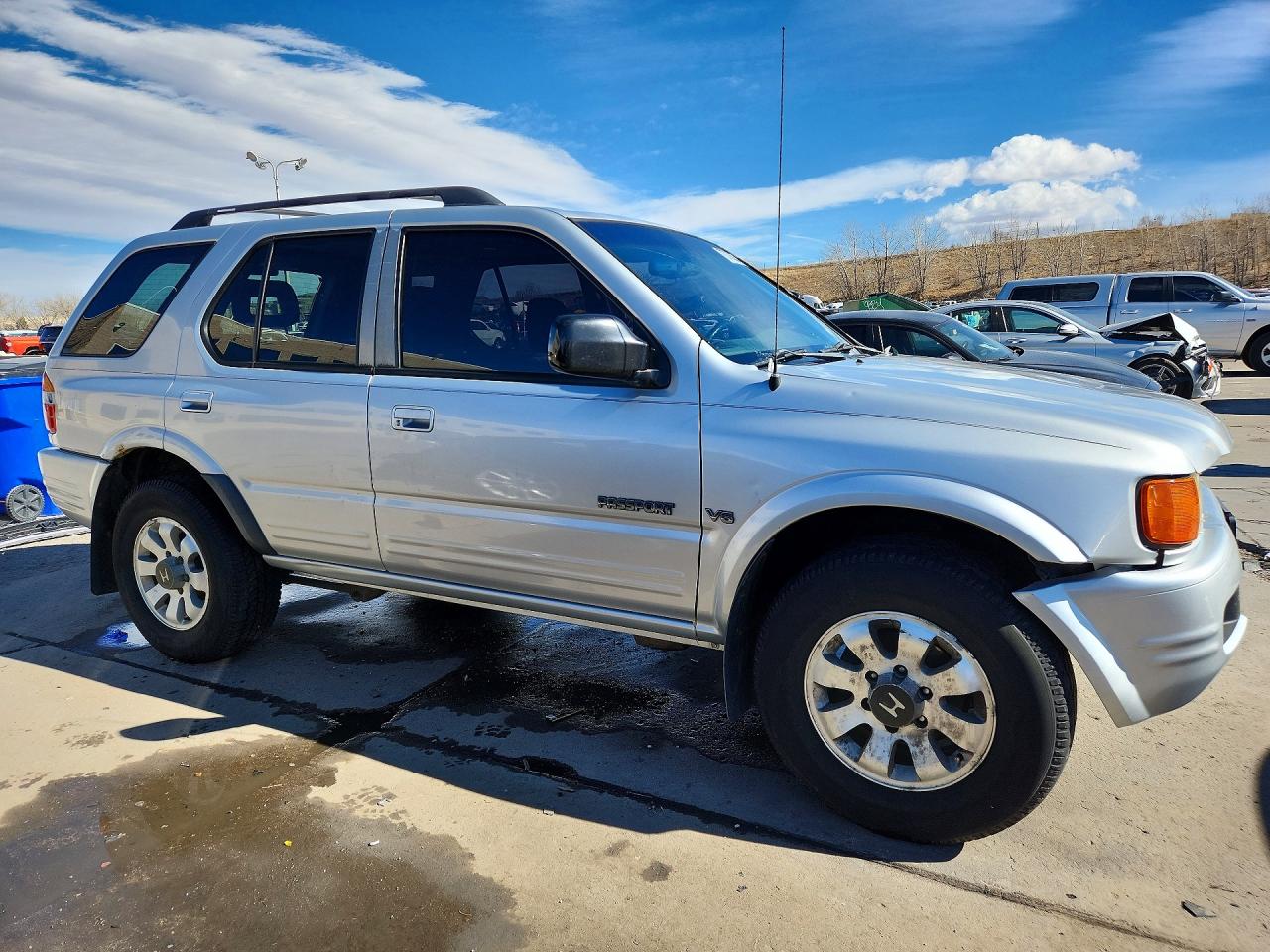 1999 Honda Passport Ex Silver vin: 4S6CM58W1X4424168