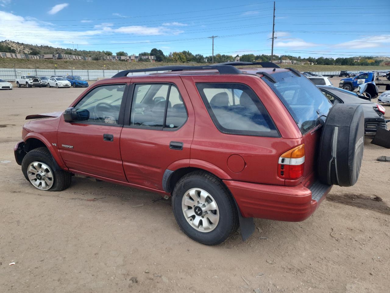2000 Honda Passport Ex Red vin: 4S6DM58W0Y4417556