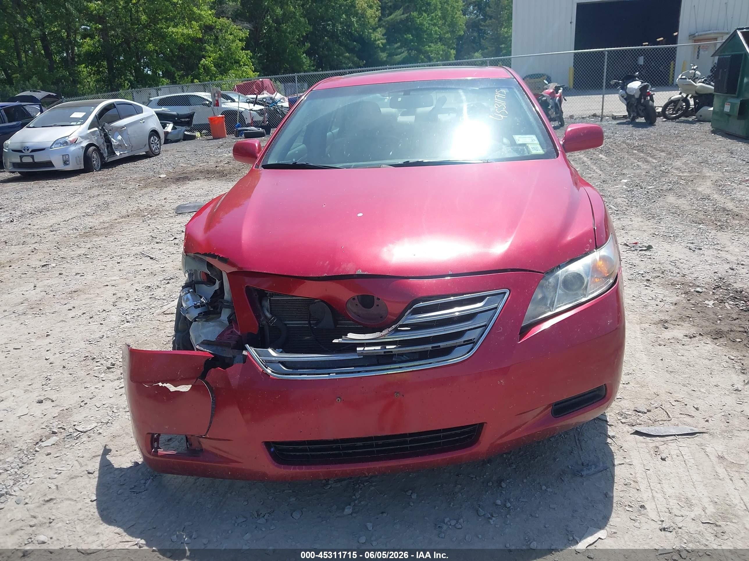 2009 Toyota Camry Hybrid   Red vin: 4T1BB46K49U067091
