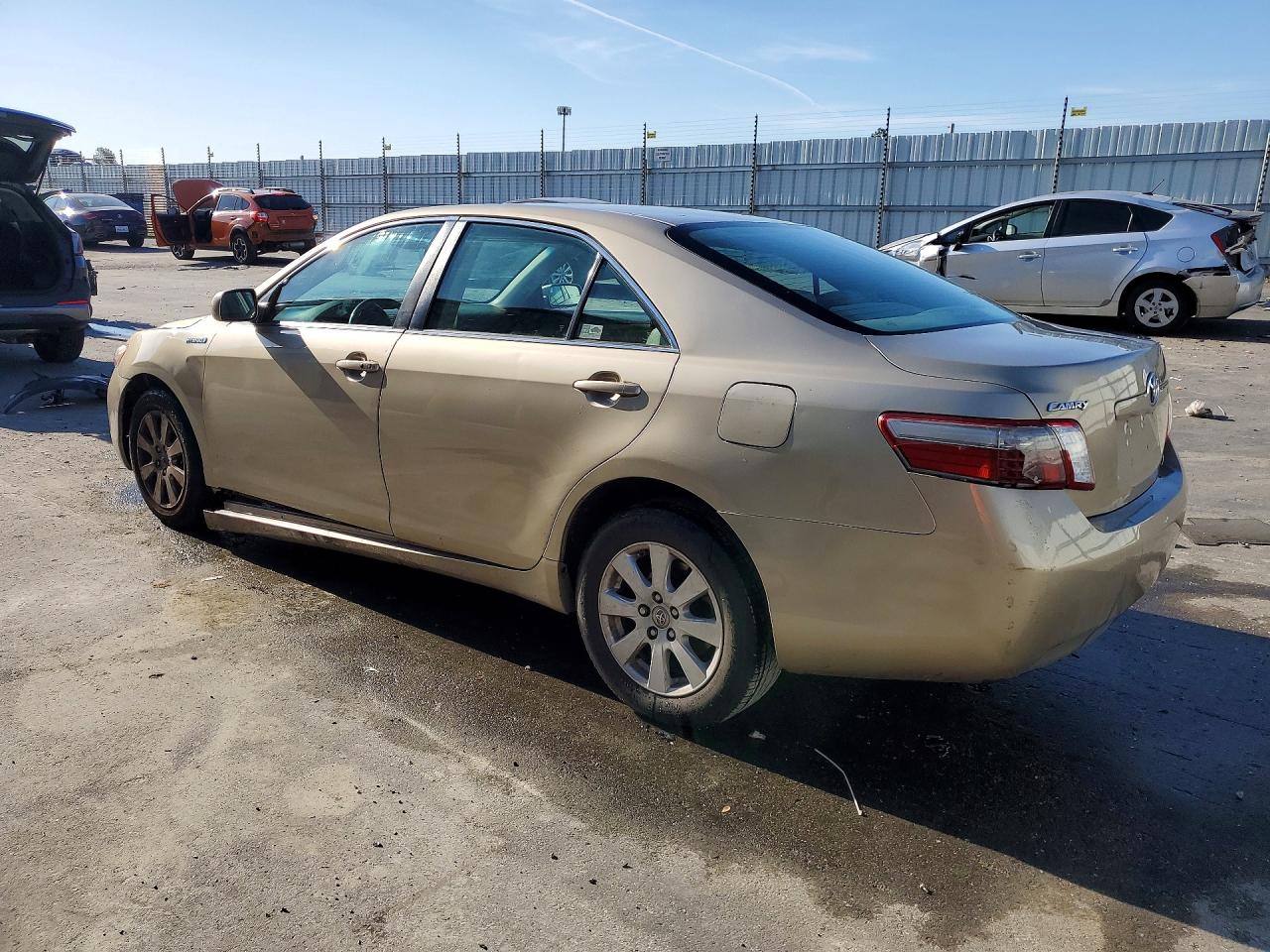 2009 Toyota Camry Hybrid Gold vin: 4T1BB46KX9U078306
