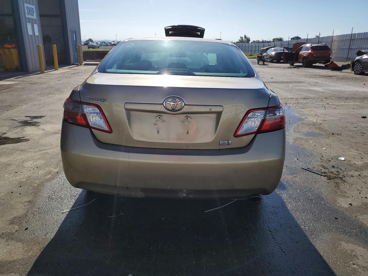 2009 Toyota Camry Hybrid Gold vin: 4T1BB46KX9U078306