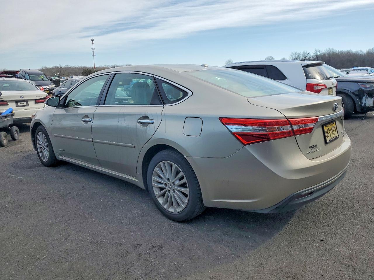 2014 Toyota Avalon Hybrid Gold vin: 4T1BD1EB1EU028527