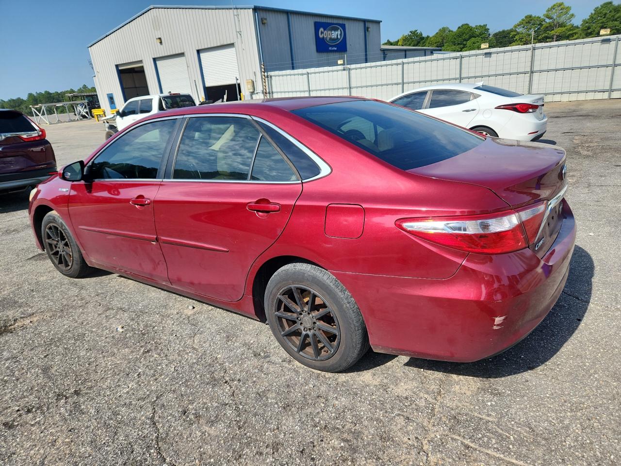 2015 Toyota Camry Hybrid Le Red vin: 4T1BD1FK0FU148741 Damage: Left Qtr Panel, Multiple Scratches Light, 4