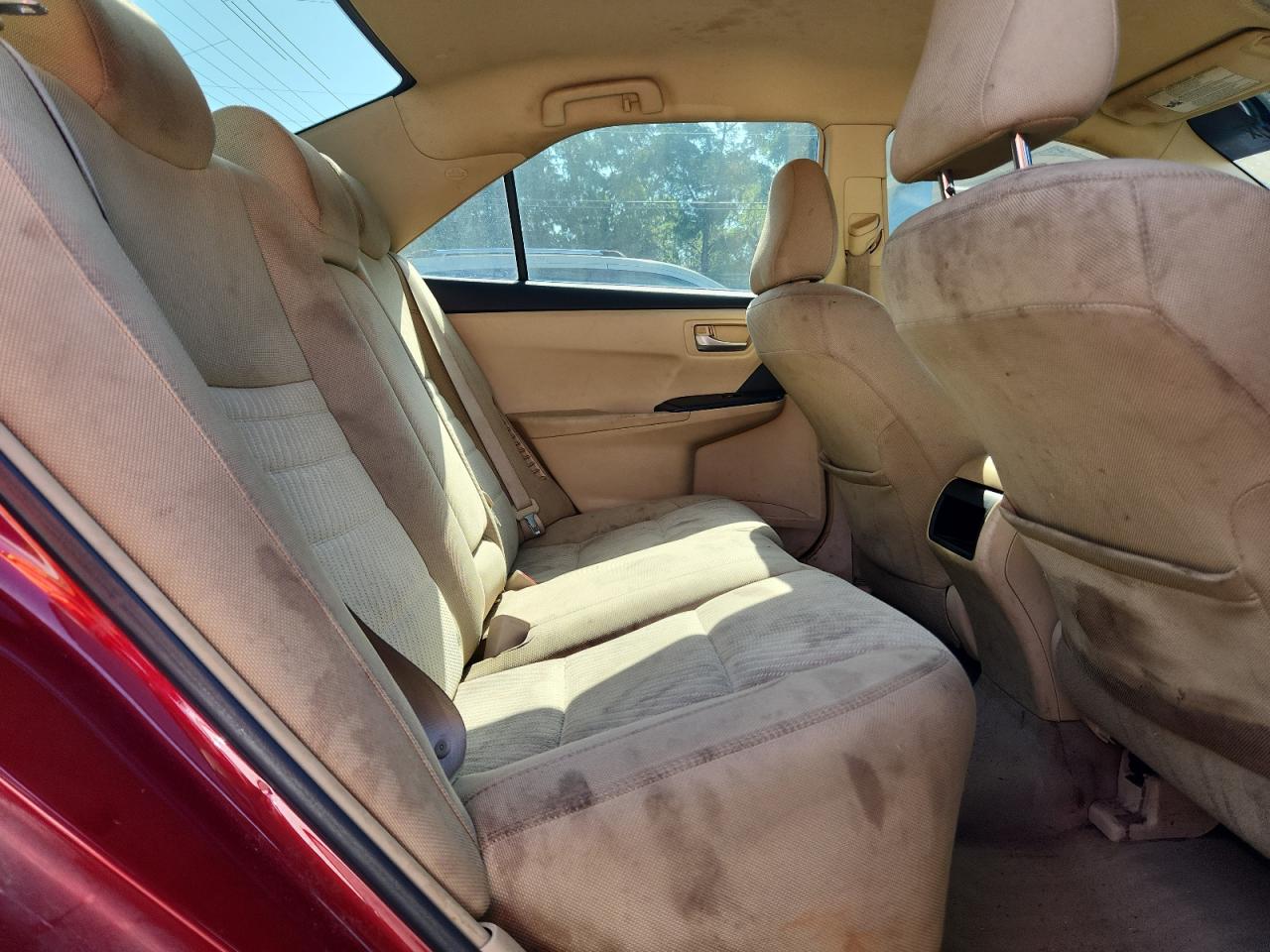2015 Toyota Camry Hybrid Le Red vin: 4T1BD1FK0FU148741 Damage: Left Rear Seat, Stained, Permanent