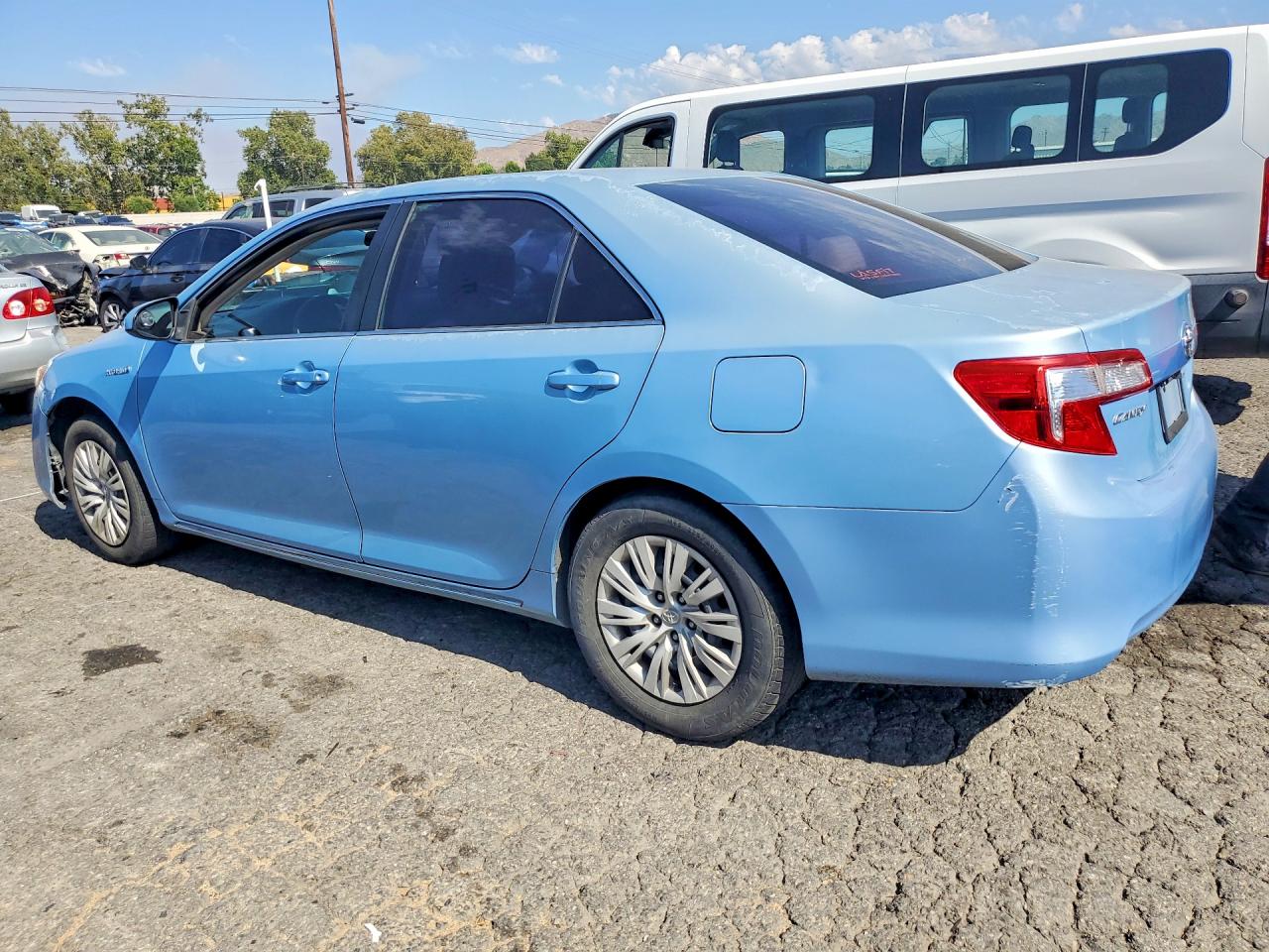 2012 Toyota Camry Hybrid Le Blue vin: 4T1BD1FK3CU036849