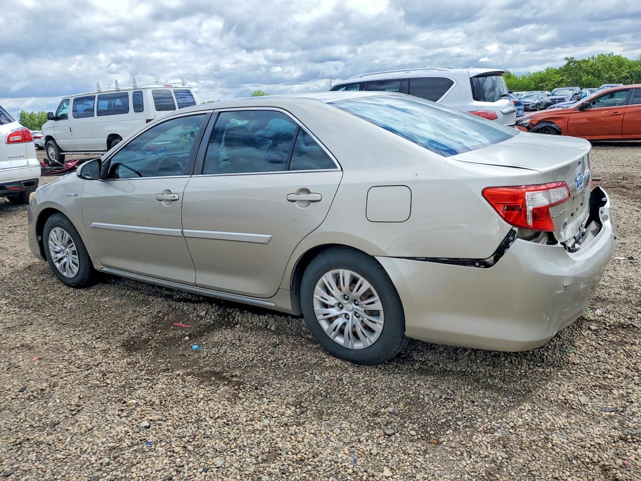 2014 Toyota Camry Hybrid Le Золотой vin: 4T1BD1FK9EU138028