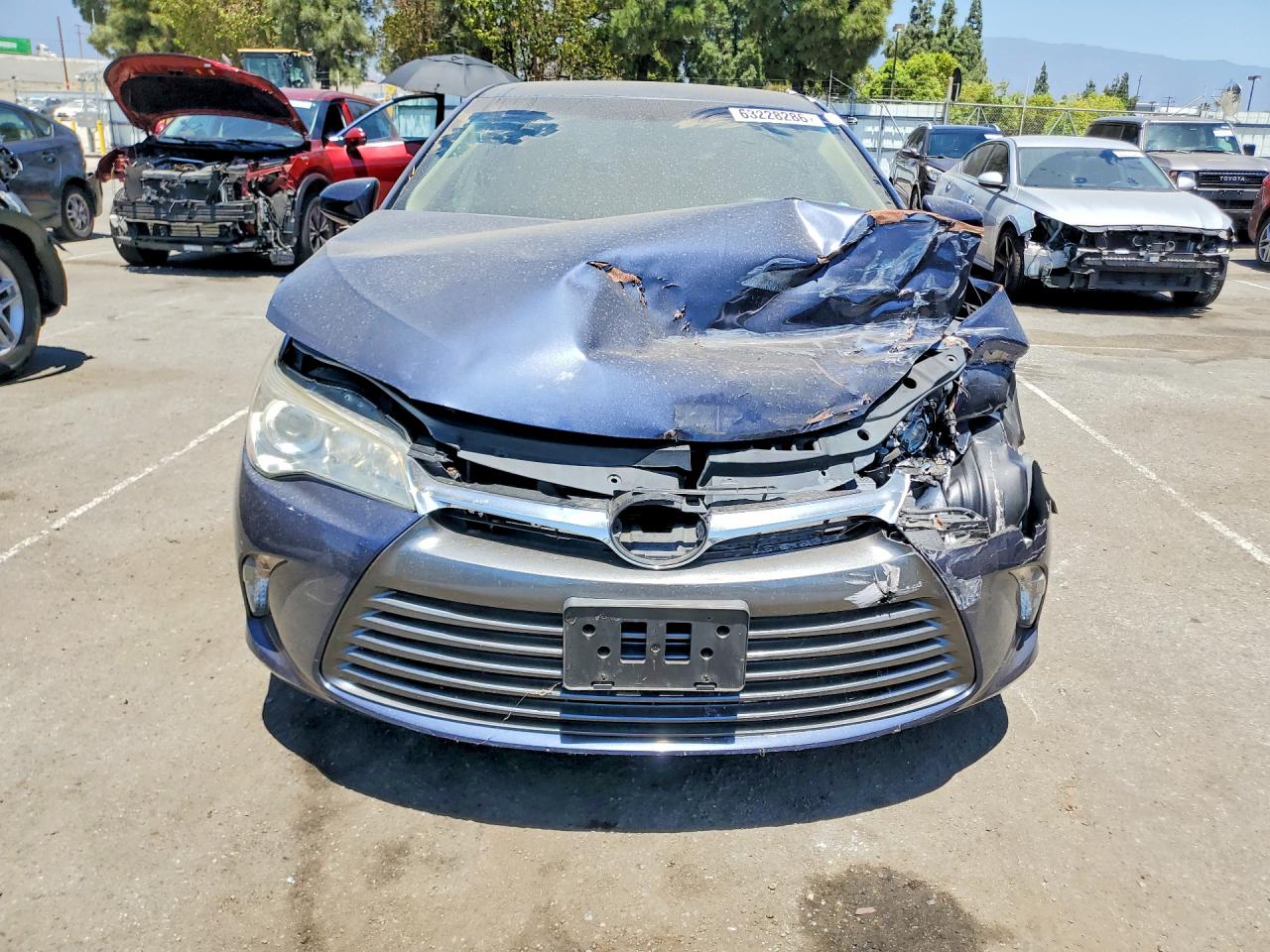 2016 Toyota Camry Hybrid Le Blue vin: 4T1BD1FKXGU196152