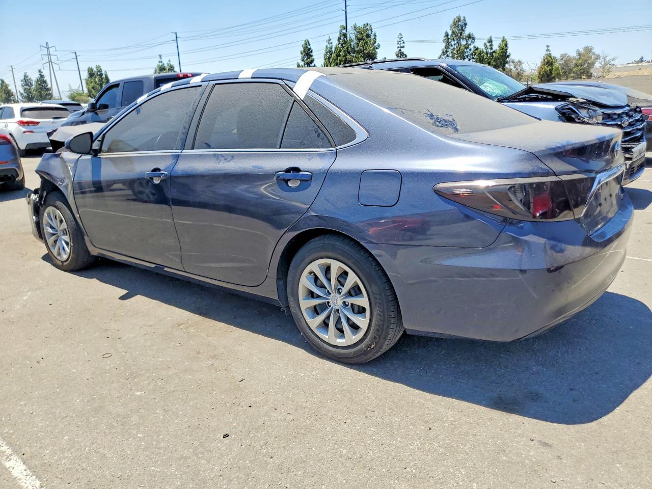 2016 Toyota Camry Hybrid Le Blue vin: 4T1BD1FKXGU196152