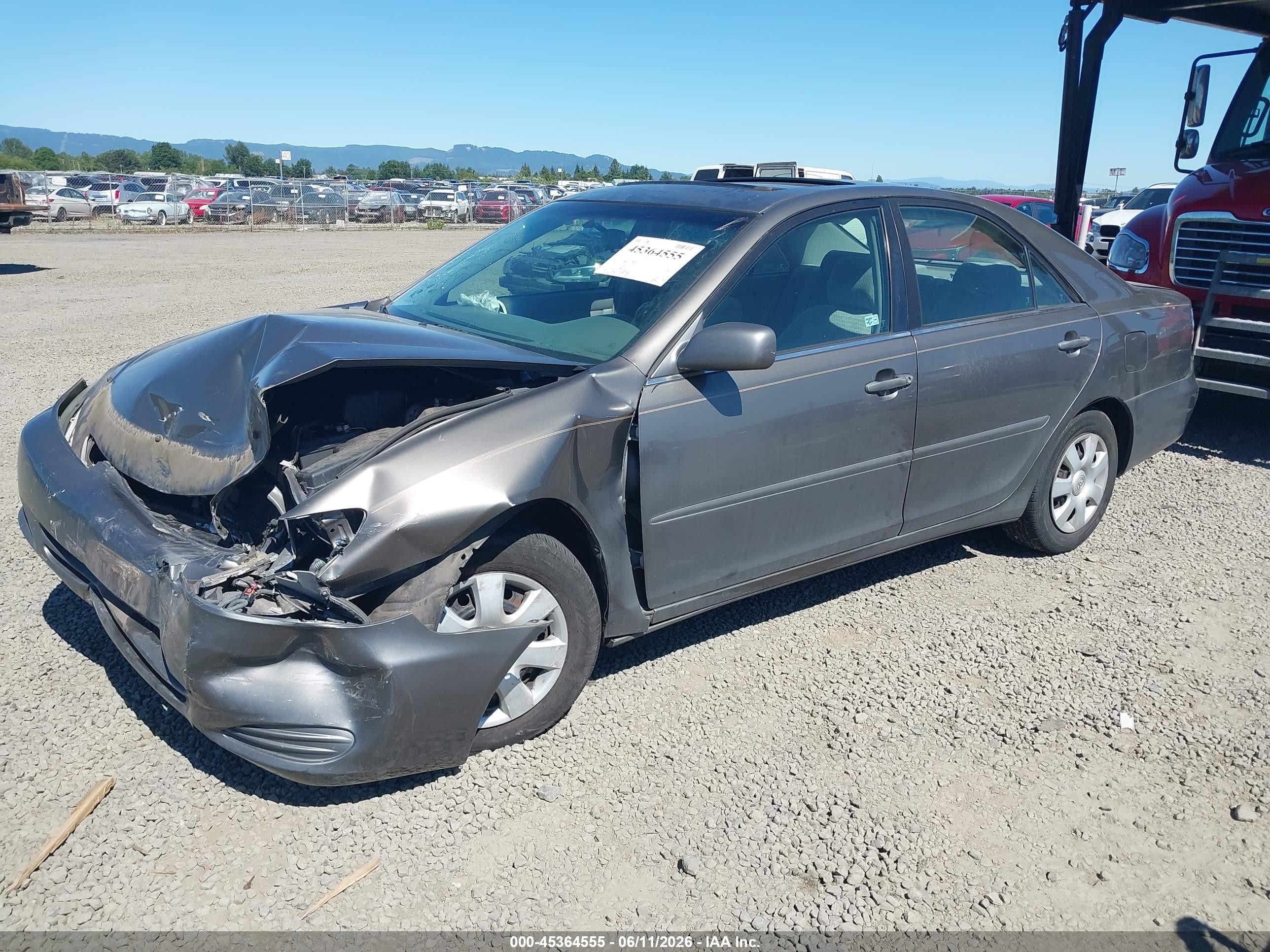 2002 Toyota Camry Le Brown vin: 4T1BE30K22U555861