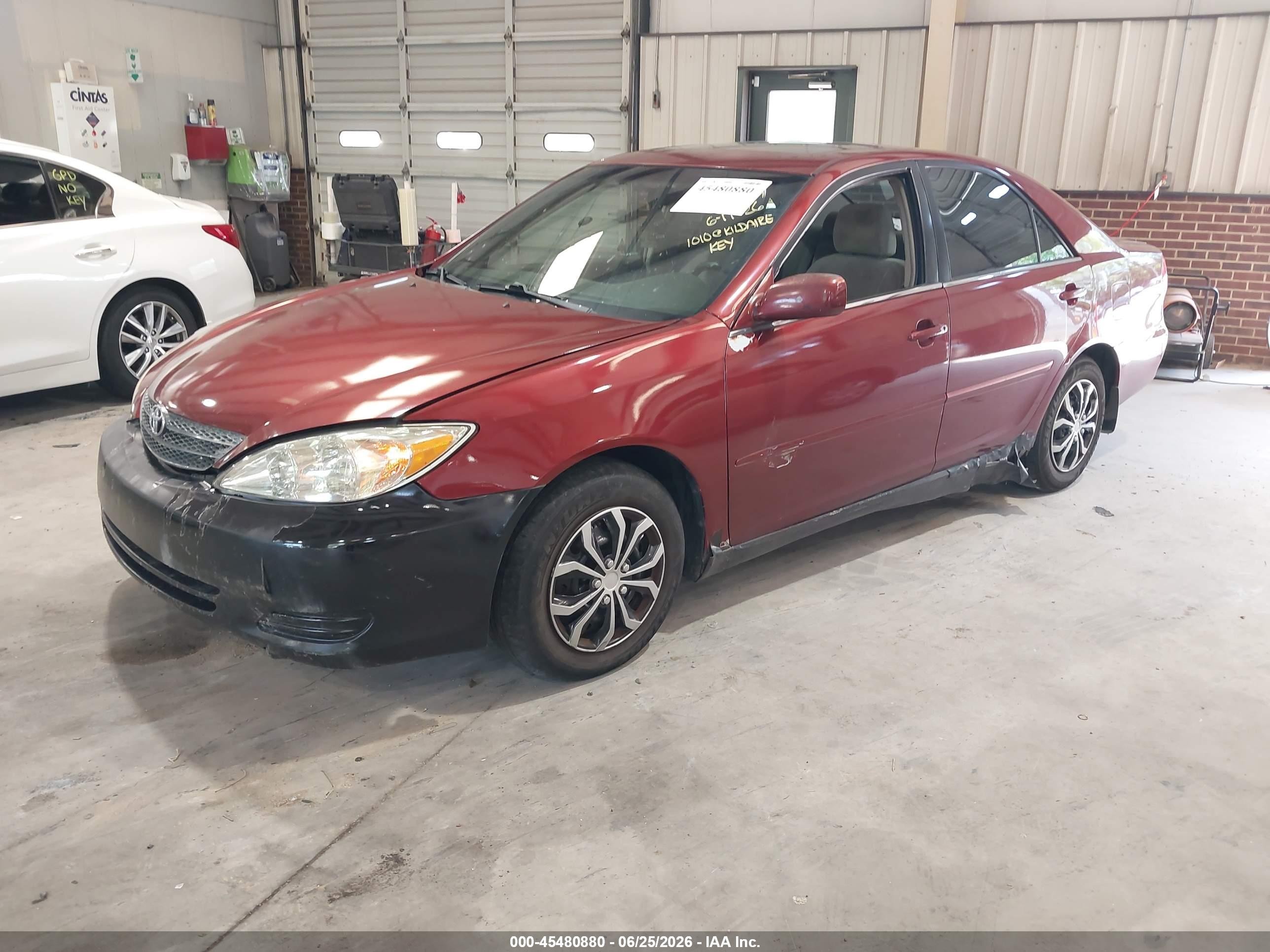 2002 Toyota Camry Le Maroon vin: 4T1BE32K02U067893