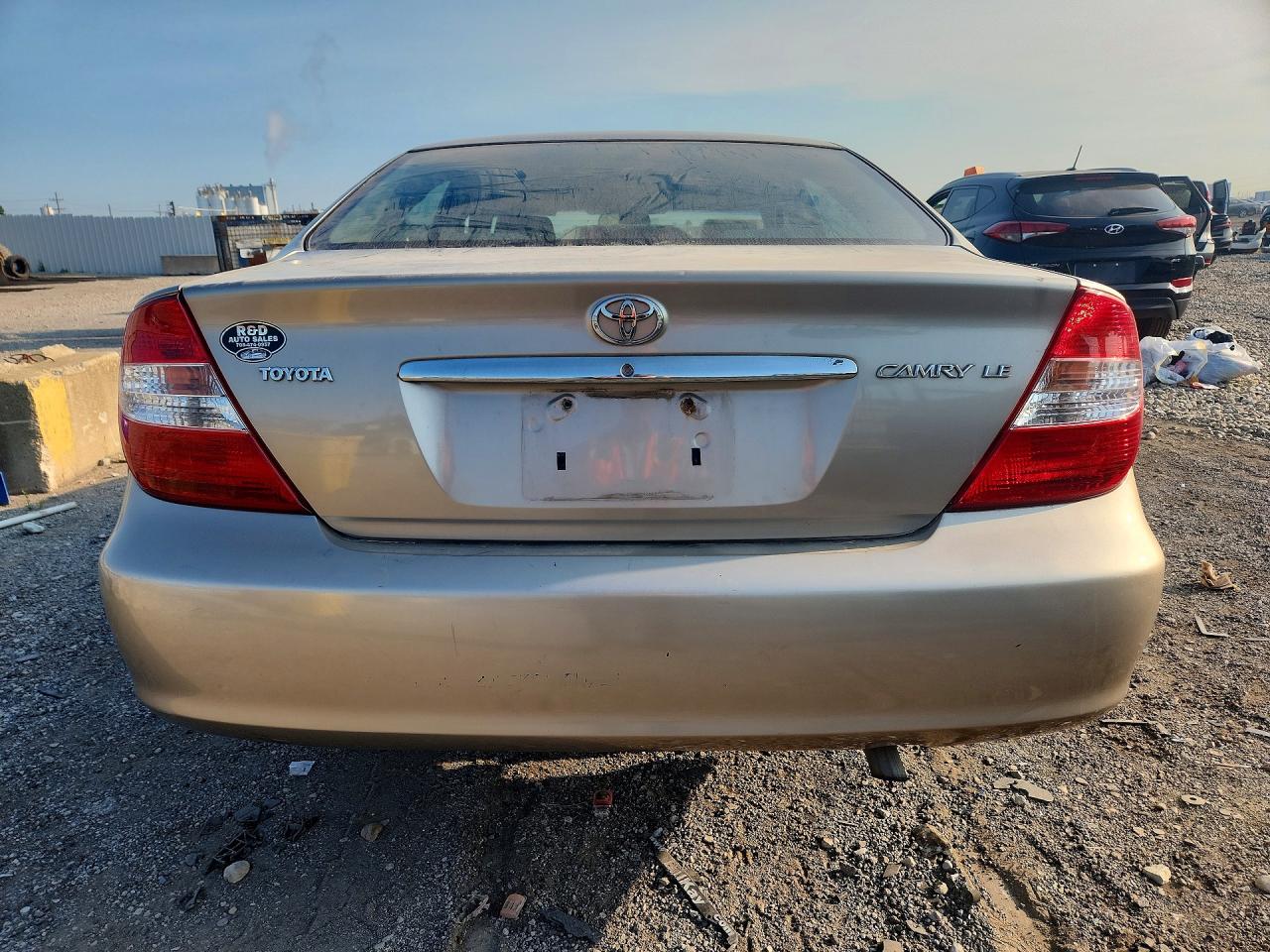 2002 Toyota Camry Le Tan vin: 4T1BE32K02U591674