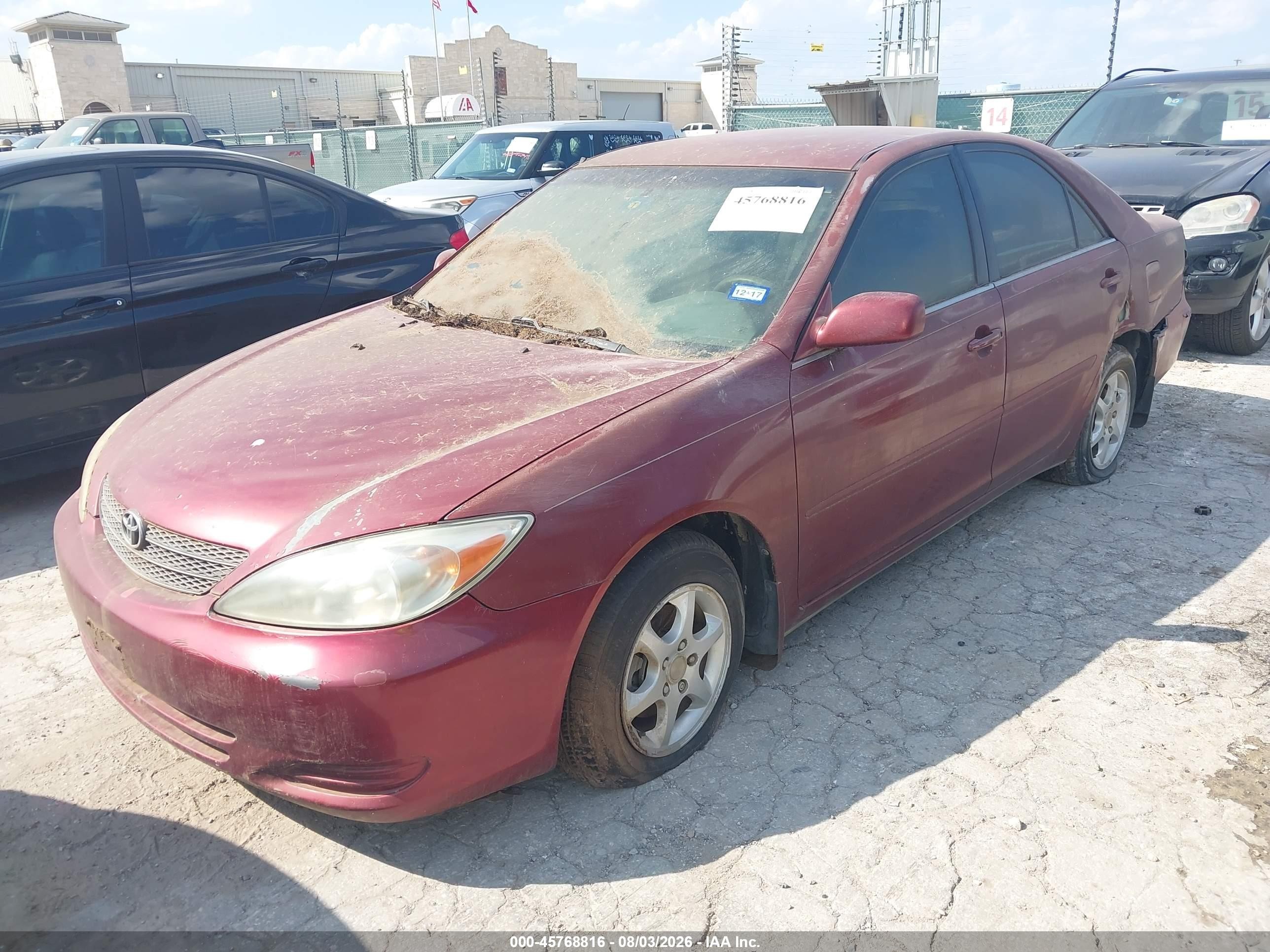 2002 Toyota Camry Le Red vin: 4T1BE32K12U031615