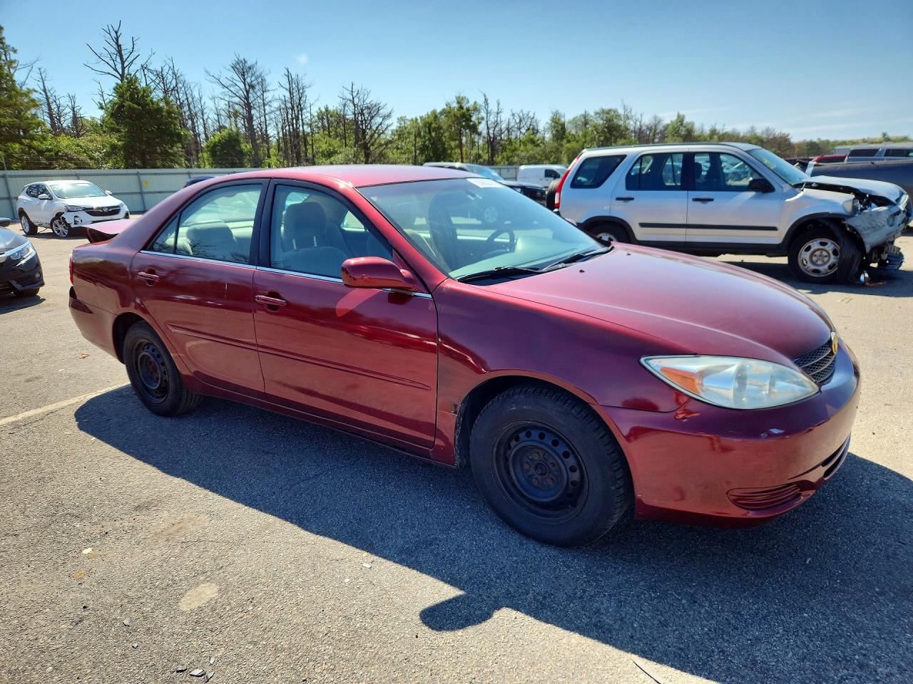 2002 Toyota Camry Le Maroon vin: 4T1BE32K12U032201
