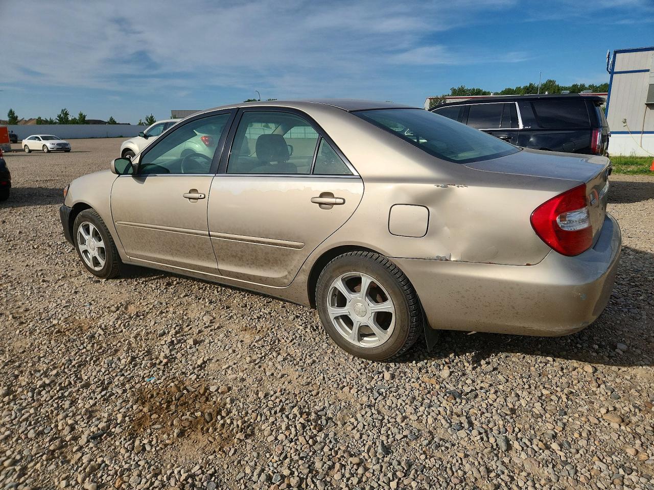 2002 Toyota Camry Le Tan vin: 4T1BE32K12U072343