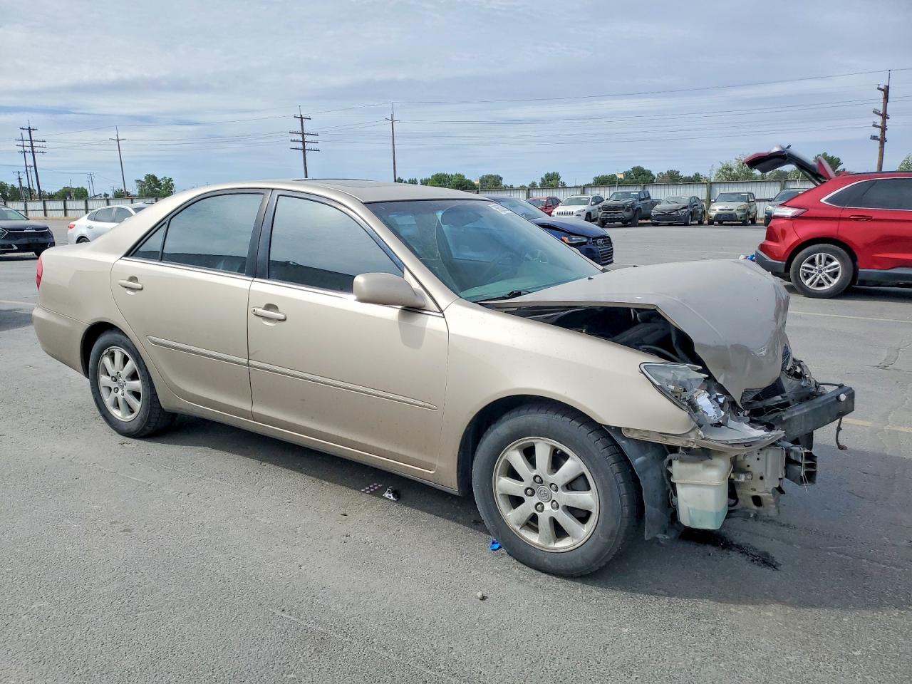 2004 Toyota Camry Xle Tan vin: 4T1BE32K14U298997