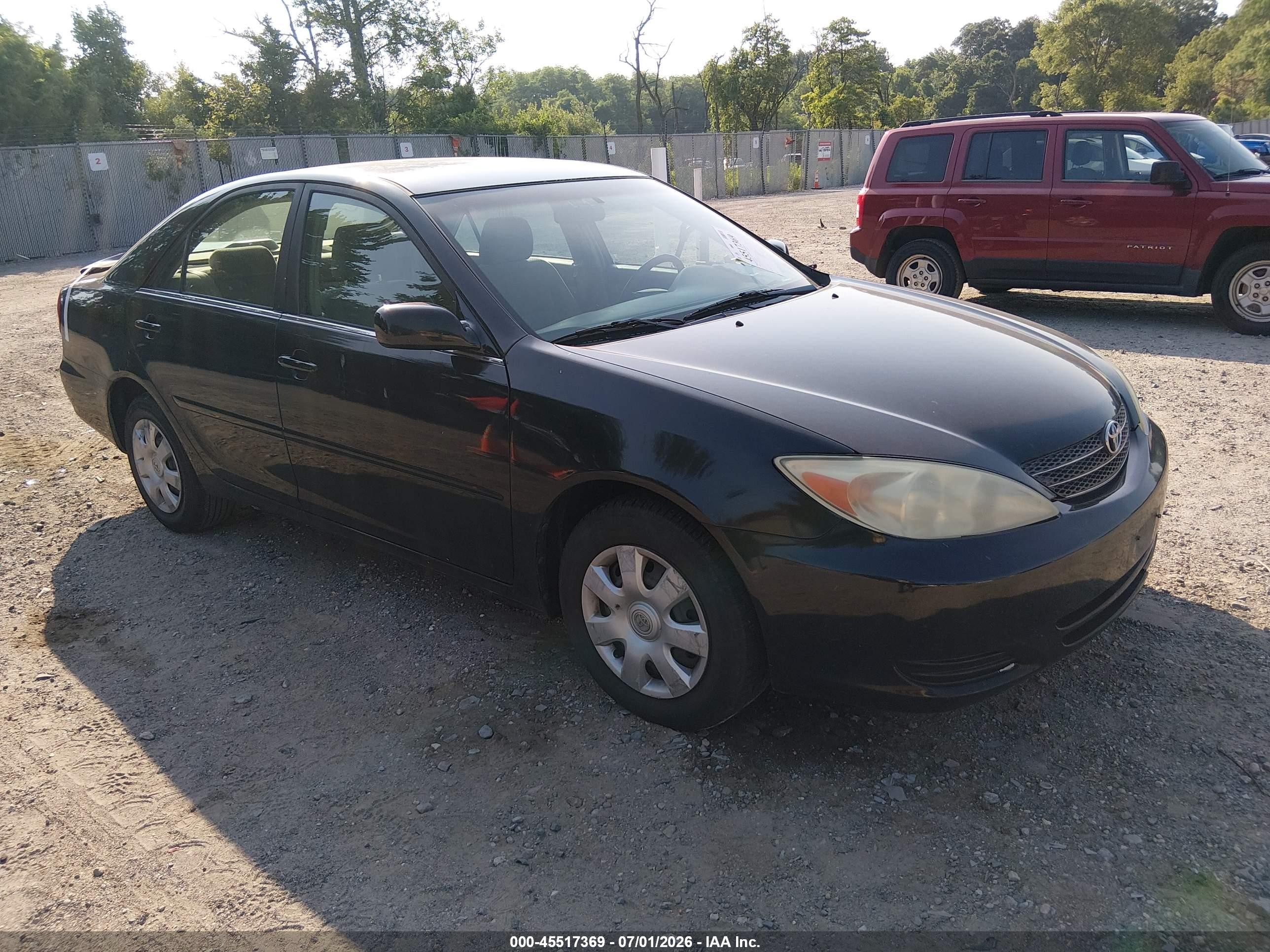 2004 Toyota Camry Le Black vin: 4T1BE32K14U314289