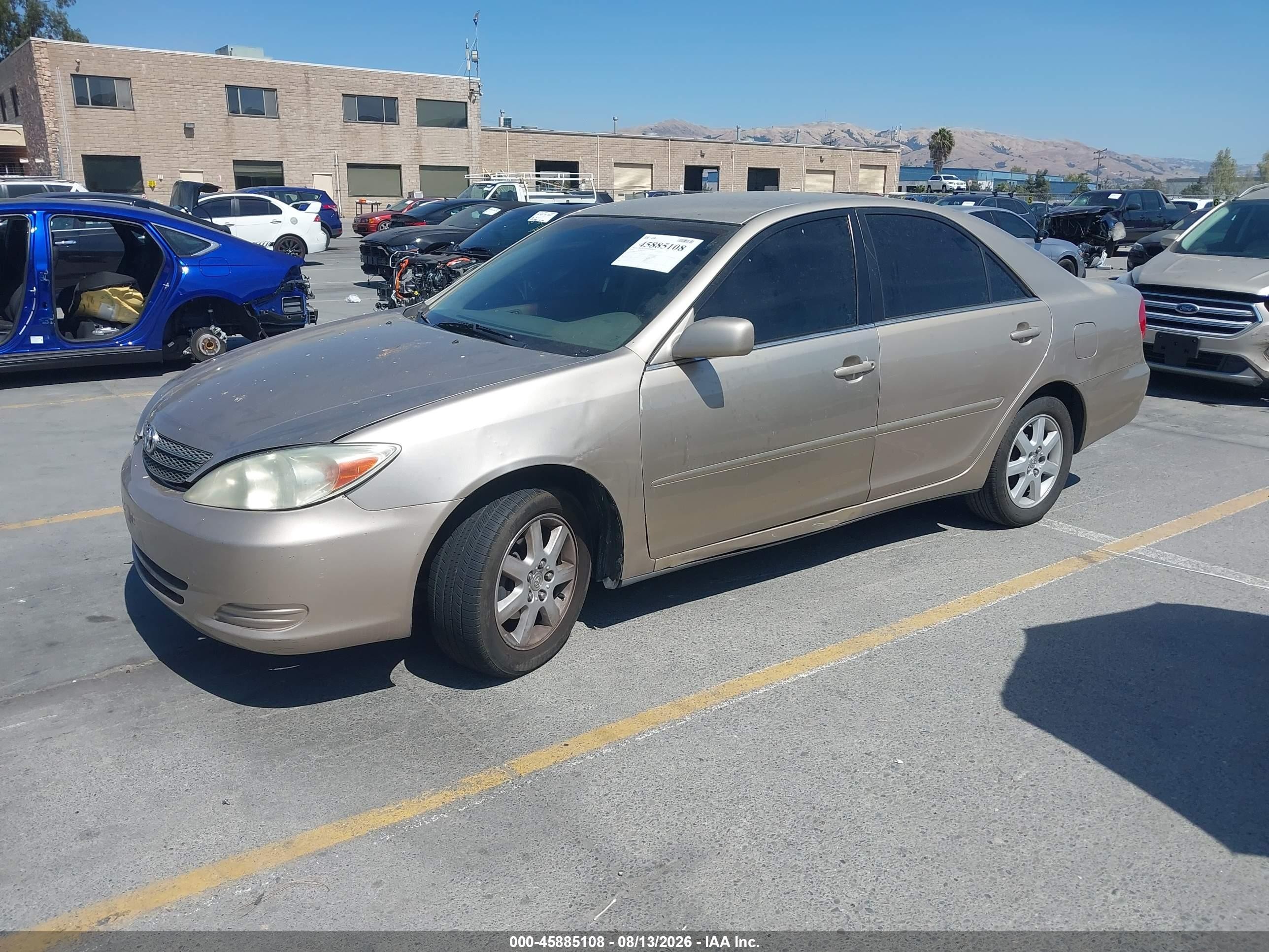 2004 Toyota Camry Le Brown vin: 4T1BE32K14U827462
