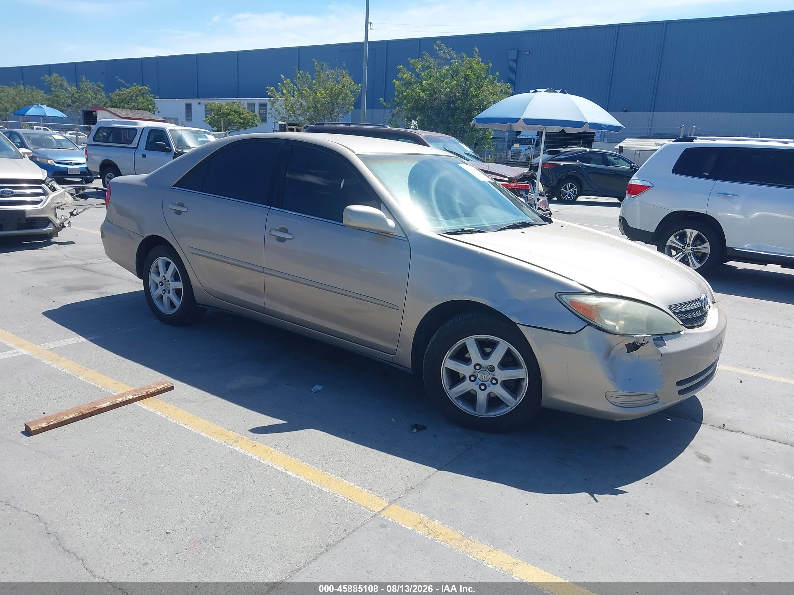 2004 Toyota Camry Le Brown vin: 4T1BE32K14U827462