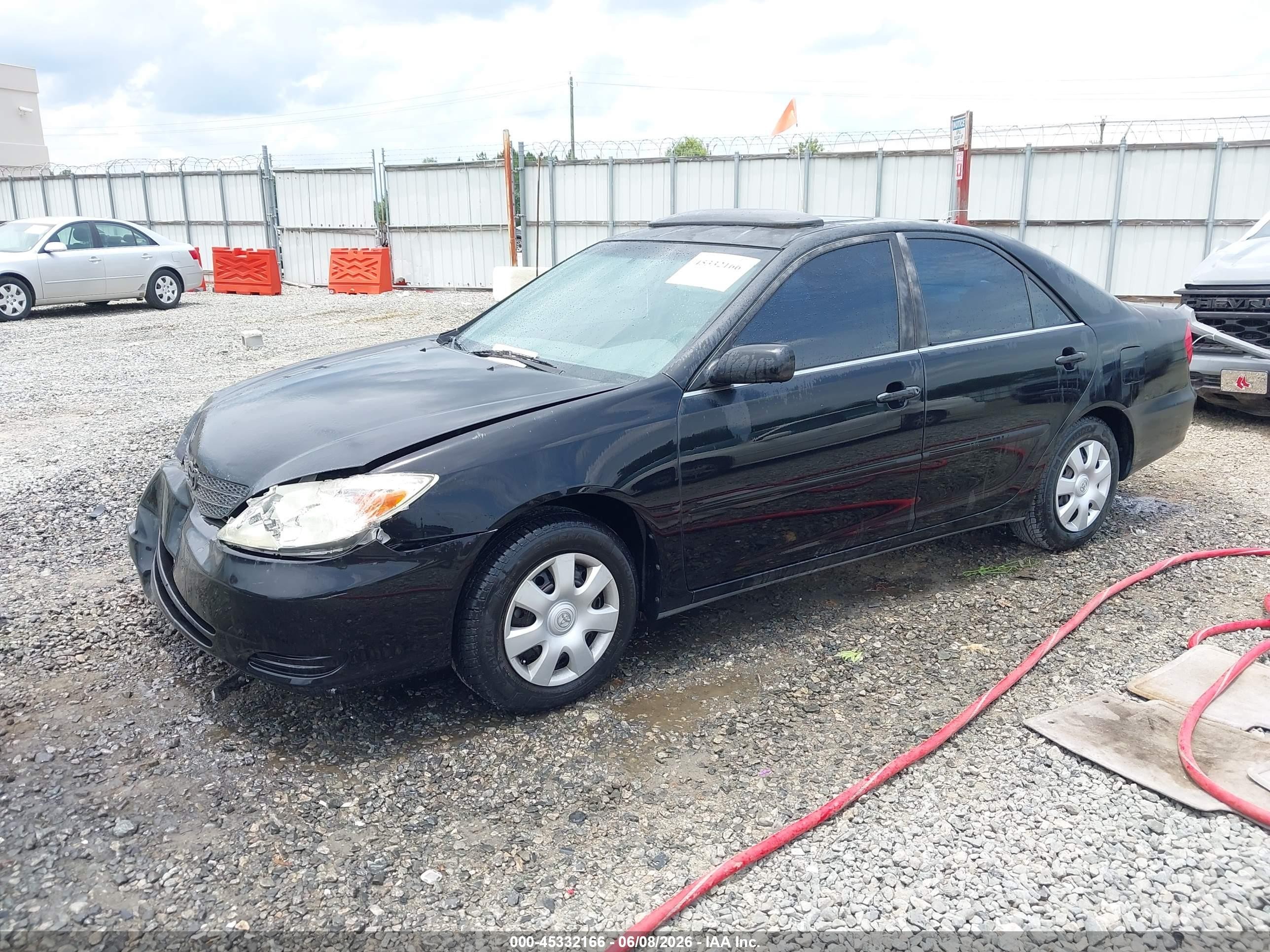 2002 Toyota Camry Le Black vin: 4T1BE32K22U005105