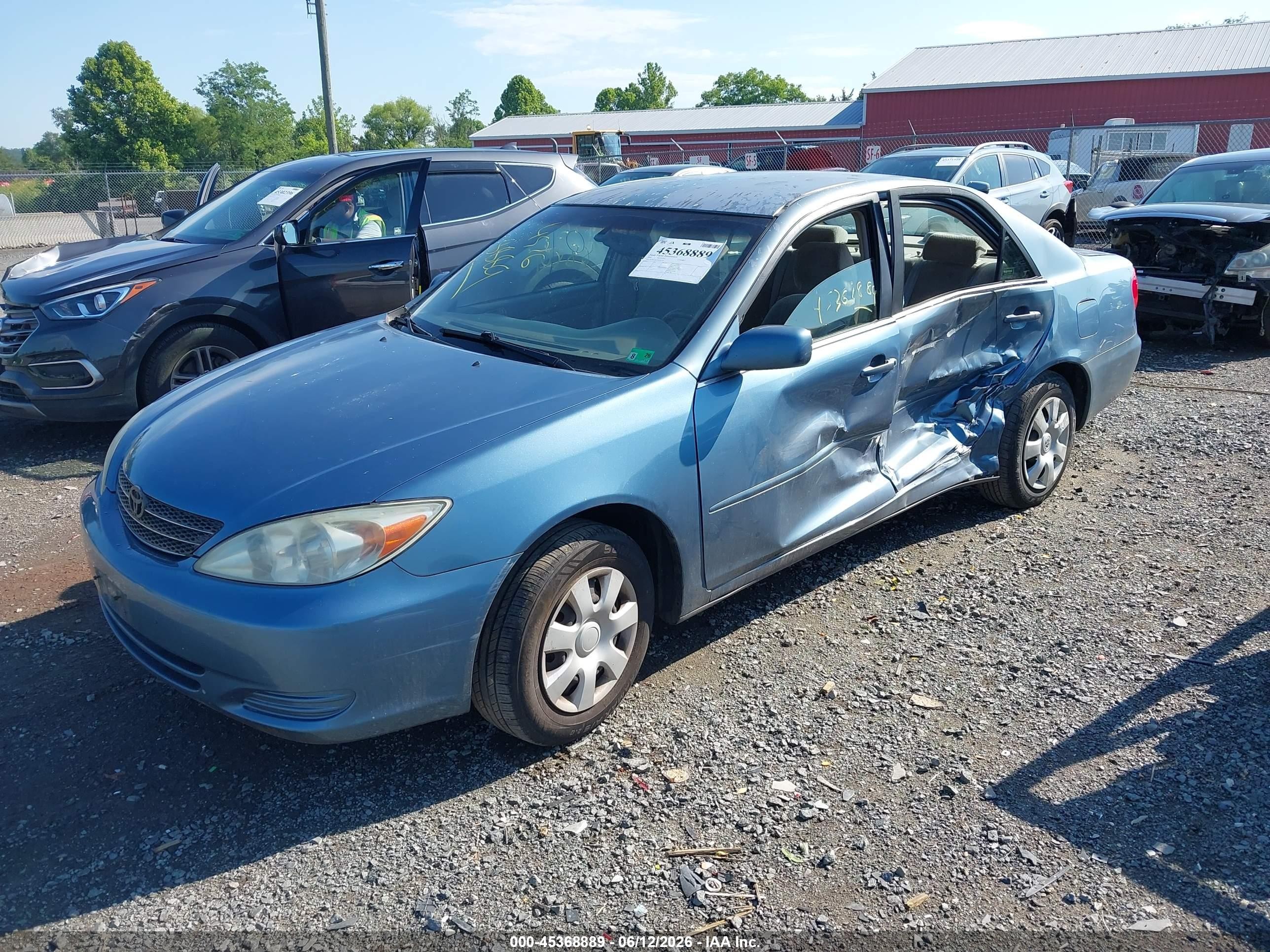 2002 Toyota Camry Le Blue vin: 4T1BE32K22U516118