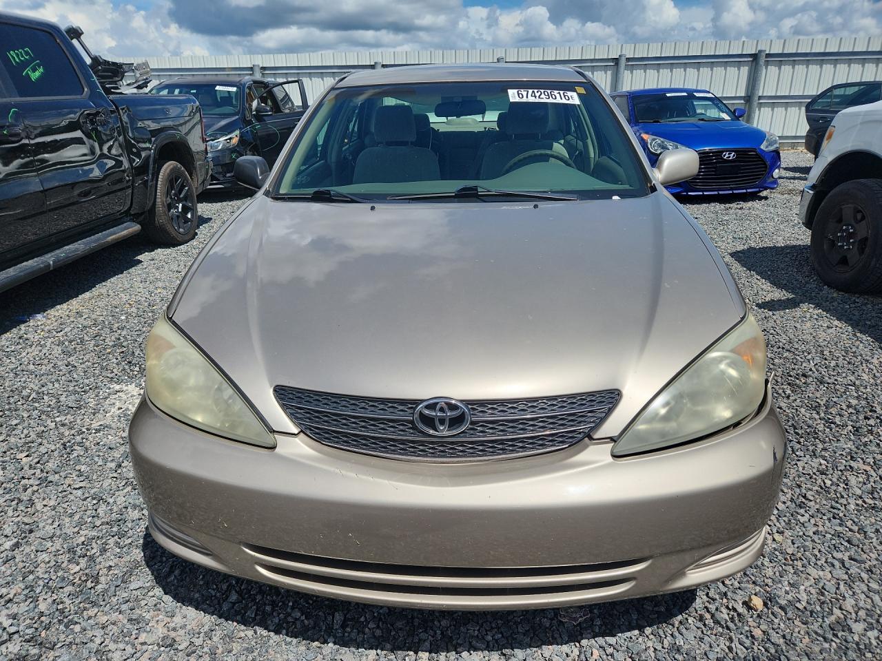 2002 Toyota Camry Le Tan vin: 4T1BE32K22U527670