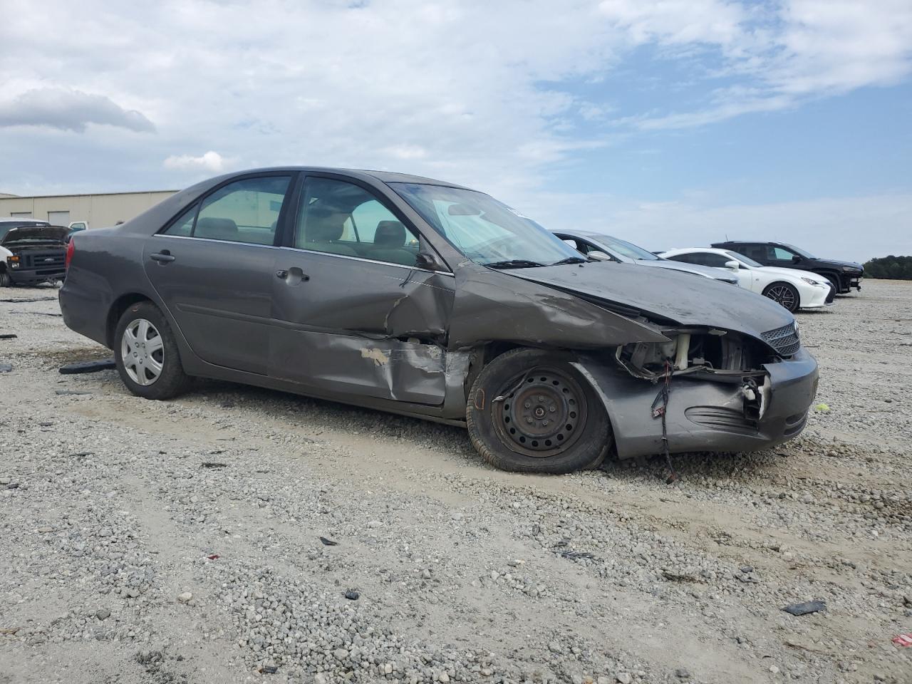 2003 Toyota Camry Le Tan vin: 4T1BE32K23U679031