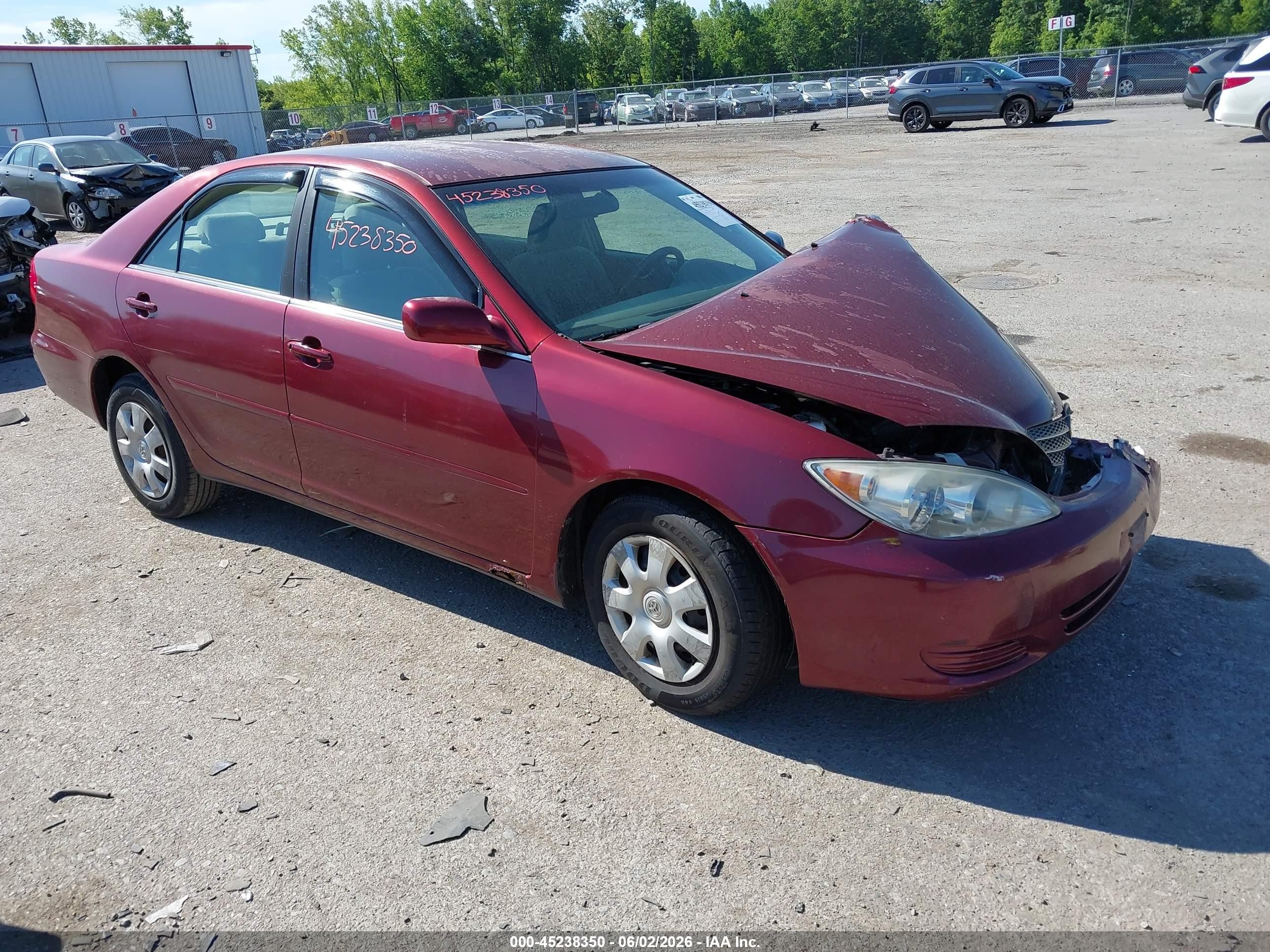 2004 Toyota Camry Le Red vin: 4T1BE32K24U361640