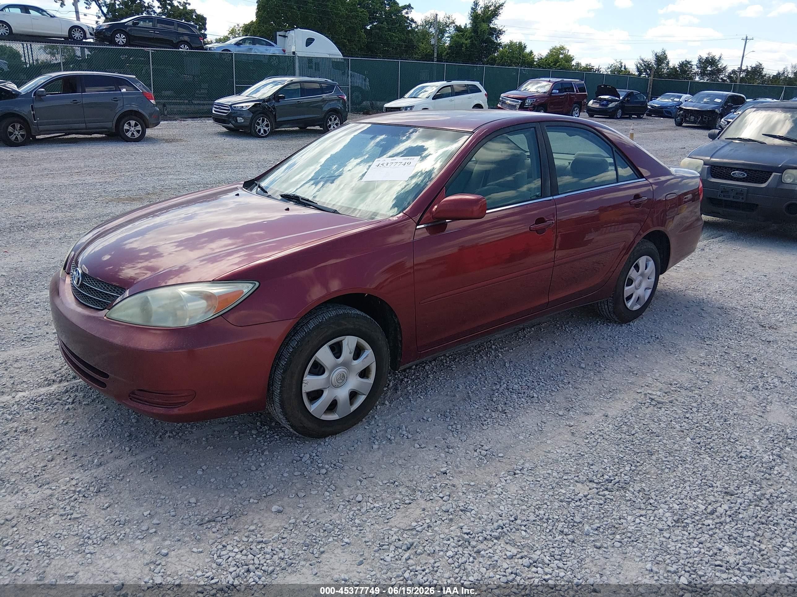 2003 Toyota Camry Le Maroon vin: 4T1BE32K33U170436
