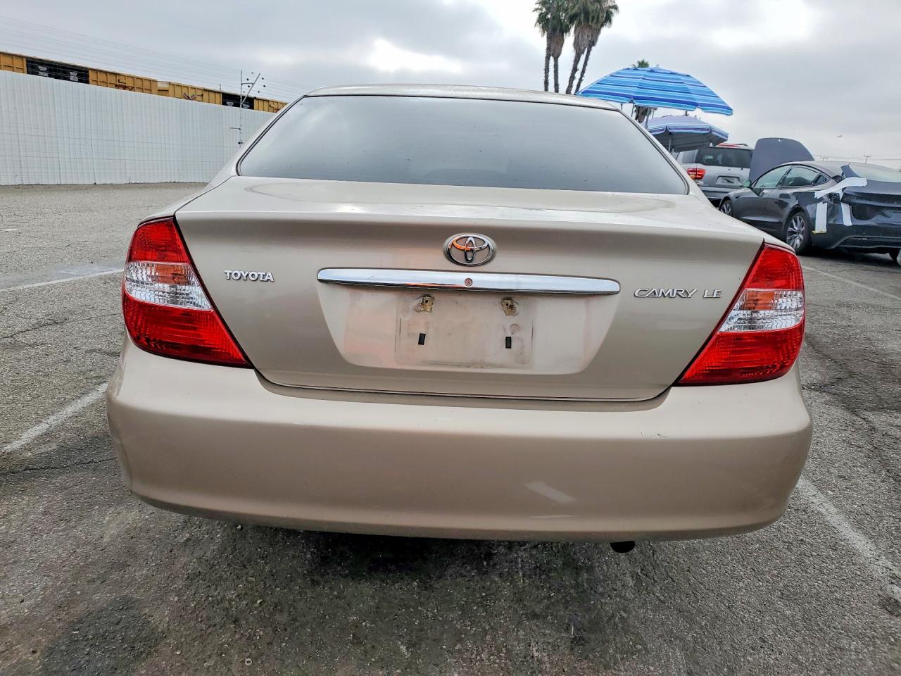 2003 Toyota Camry Le Tan vin: 4T1BE32K33U759177