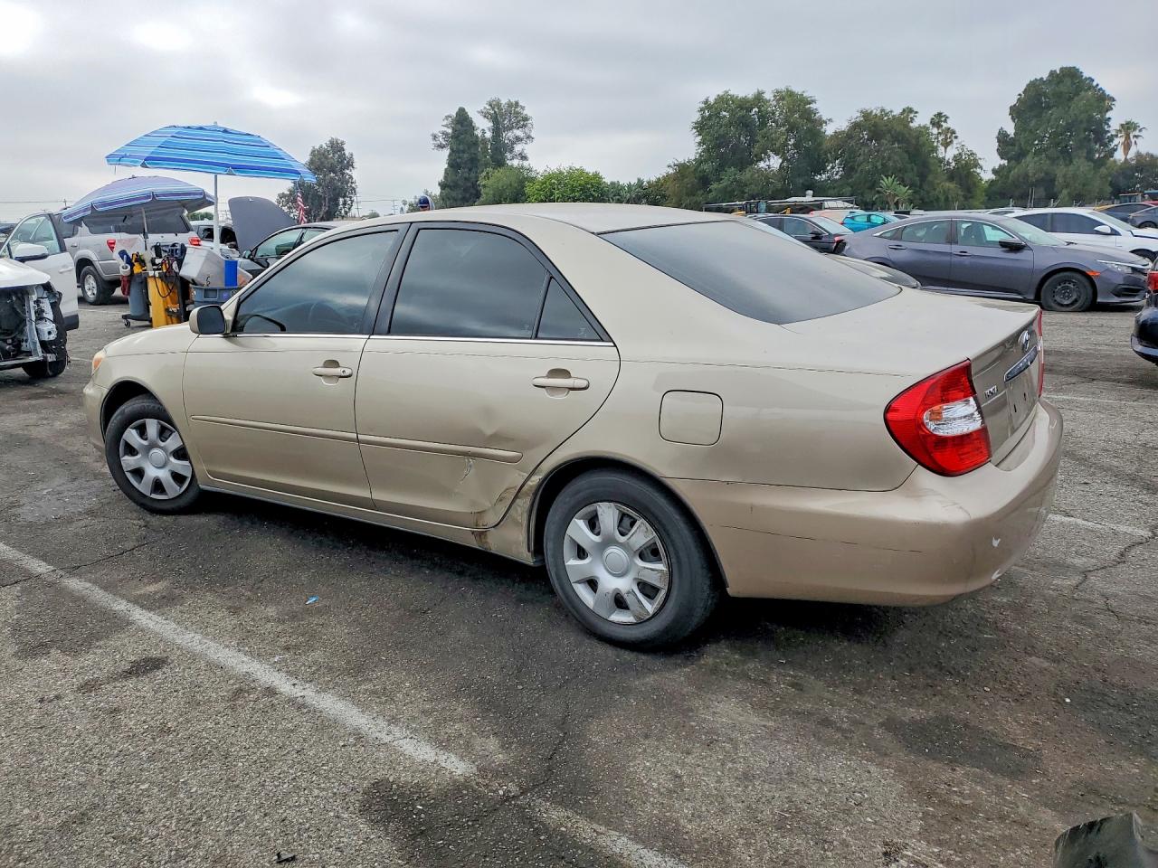 2003 Toyota Camry Le Tan vin: 4T1BE32K33U759177