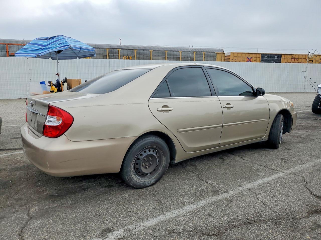 2003 Toyota Camry Le Tan vin: 4T1BE32K33U759177