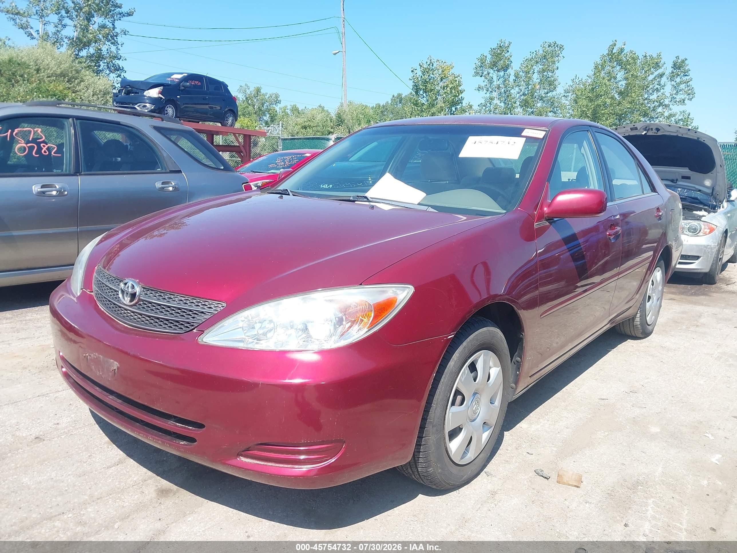 2004 Toyota Camry Le Red vin: 4T1BE32K34U316013